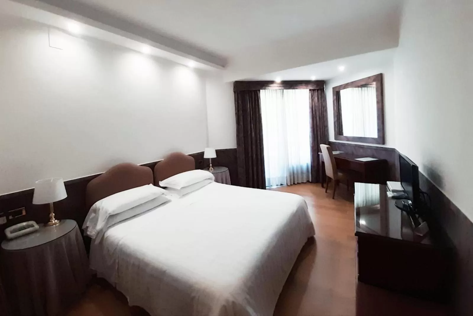 Bed in Mini Palace Hotel