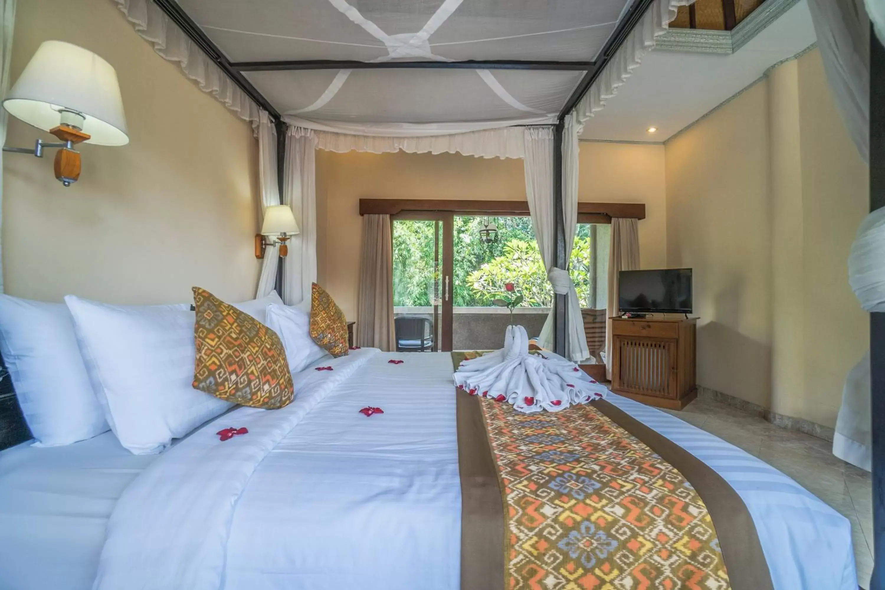 Photo of the whole room, Bed in Cendana Resort & Spa by Mahaputra