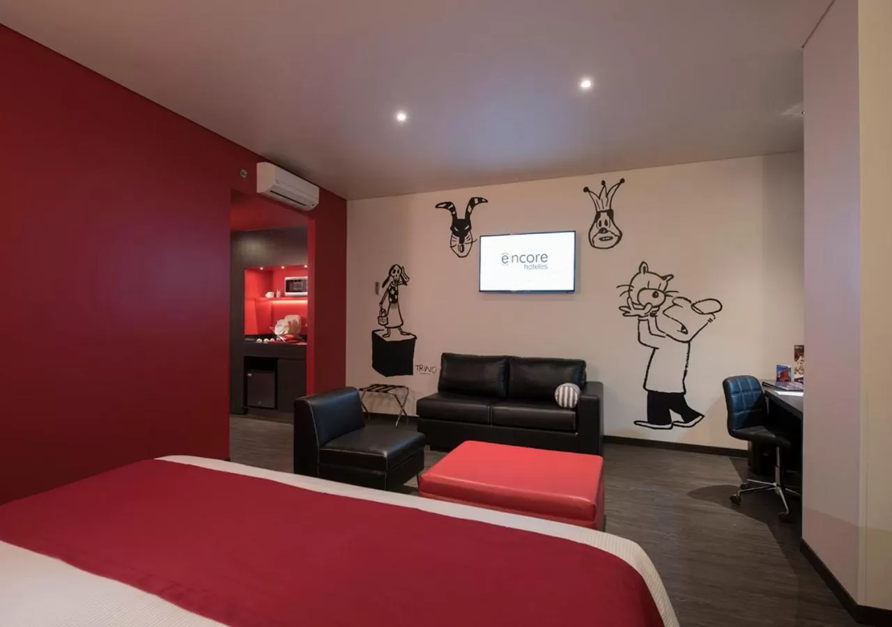 Living room, Bed in Ramada Encore by Wyndham San Luis Potosi