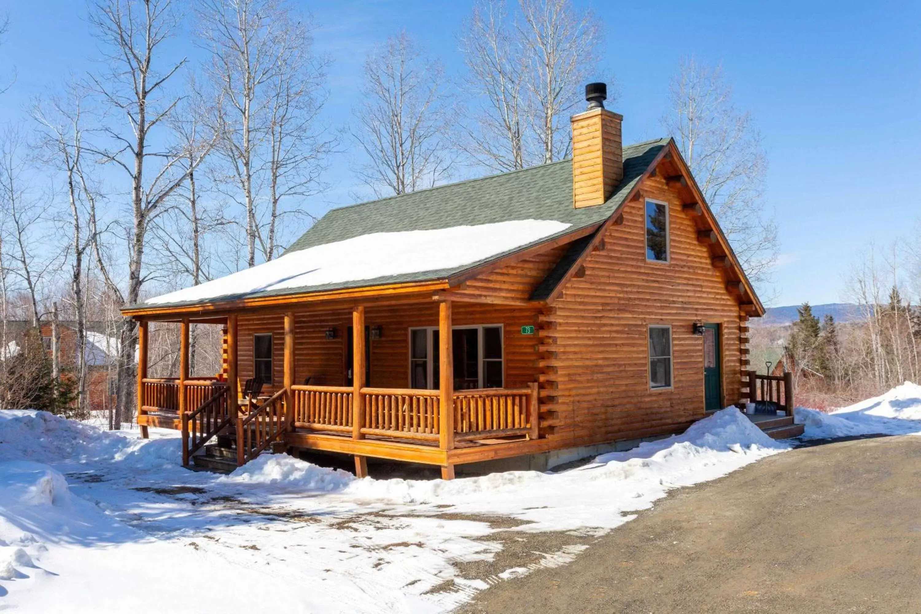 Bed, Winter in Rangeley Lake Resort a Ramada by Wyndham