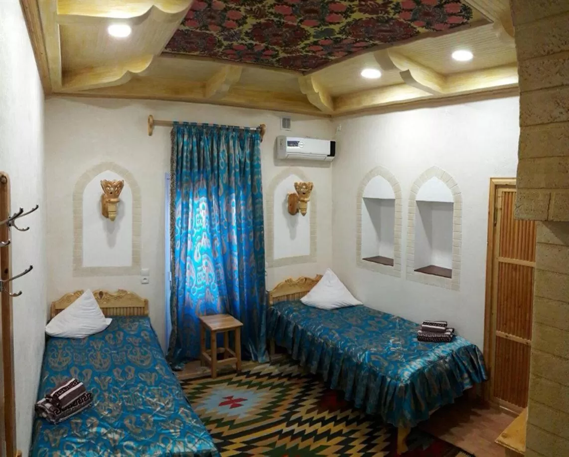 Bed in Zukhro Boutique Hotel
