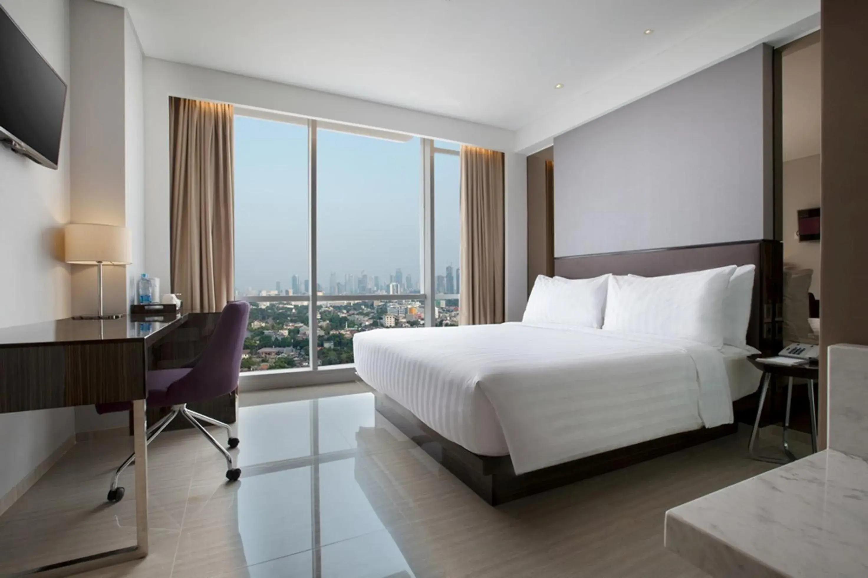 Deluxe Twin Room in Hotel Santika Premiere Hayam Wuruk Jakarta