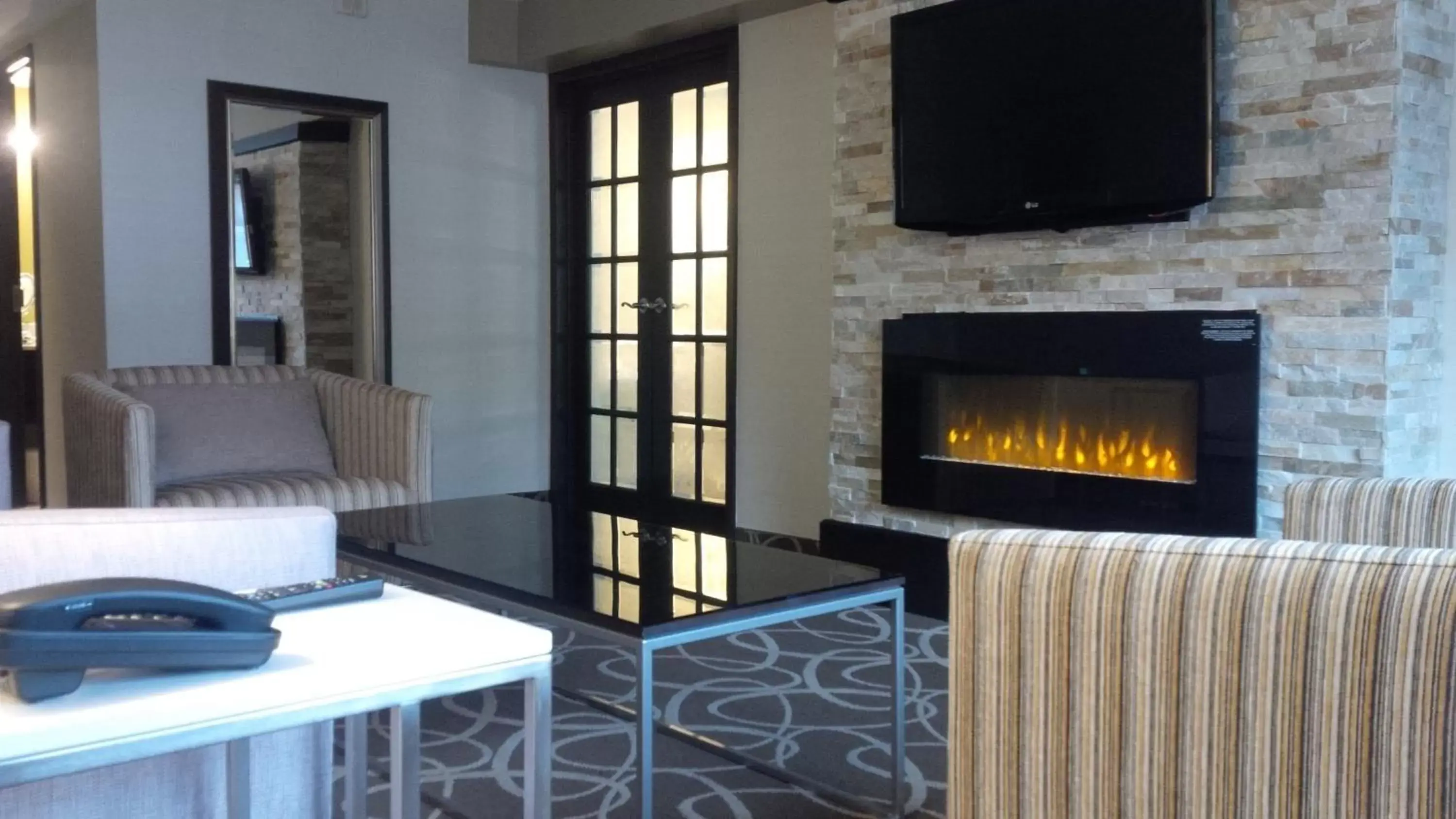 Photo of the whole room, TV/Entertainment Center in Crowne Plaza Kitchener-Waterloo, an IHG Hotel