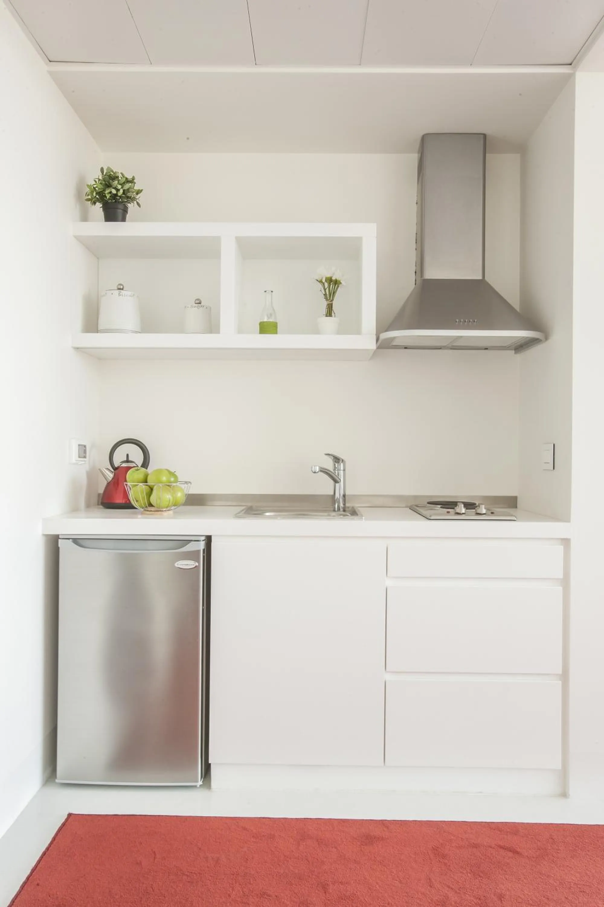 Kitchen or kitchenette in 1866 Court & Suites Hotel