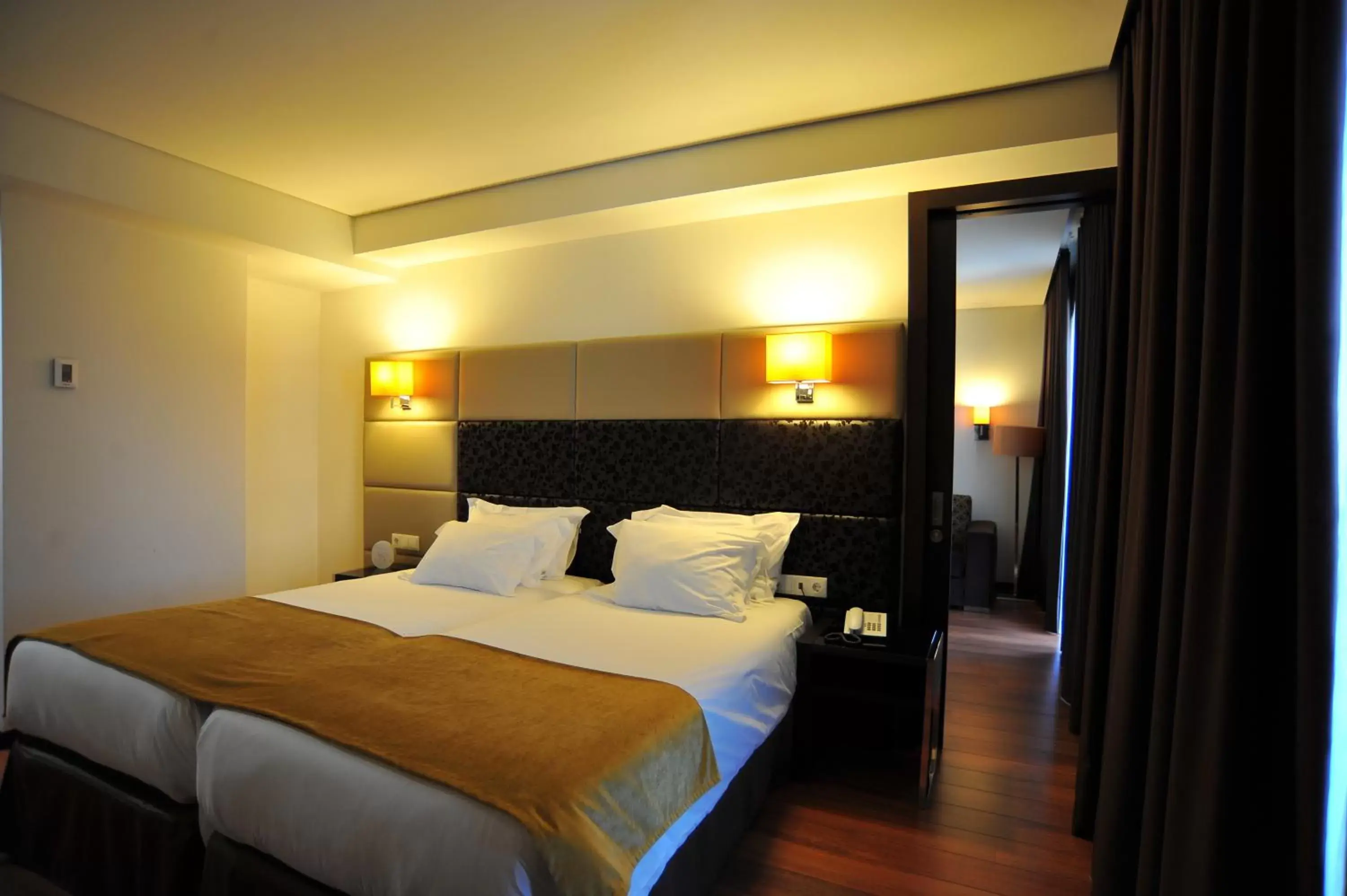 Bed in Axis Porto Business & Spa Hotel