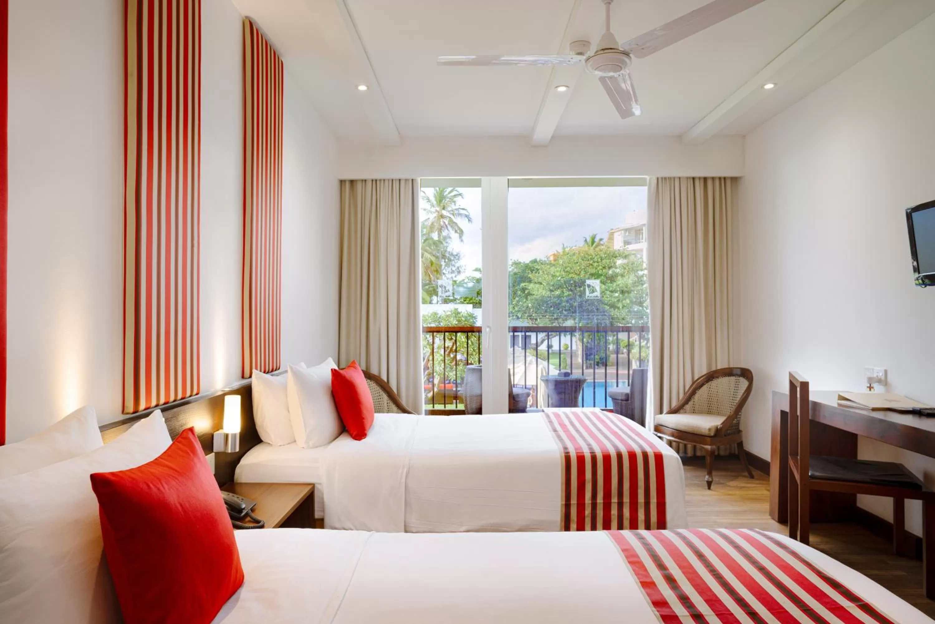 Bed in Camelot Beach Hotel