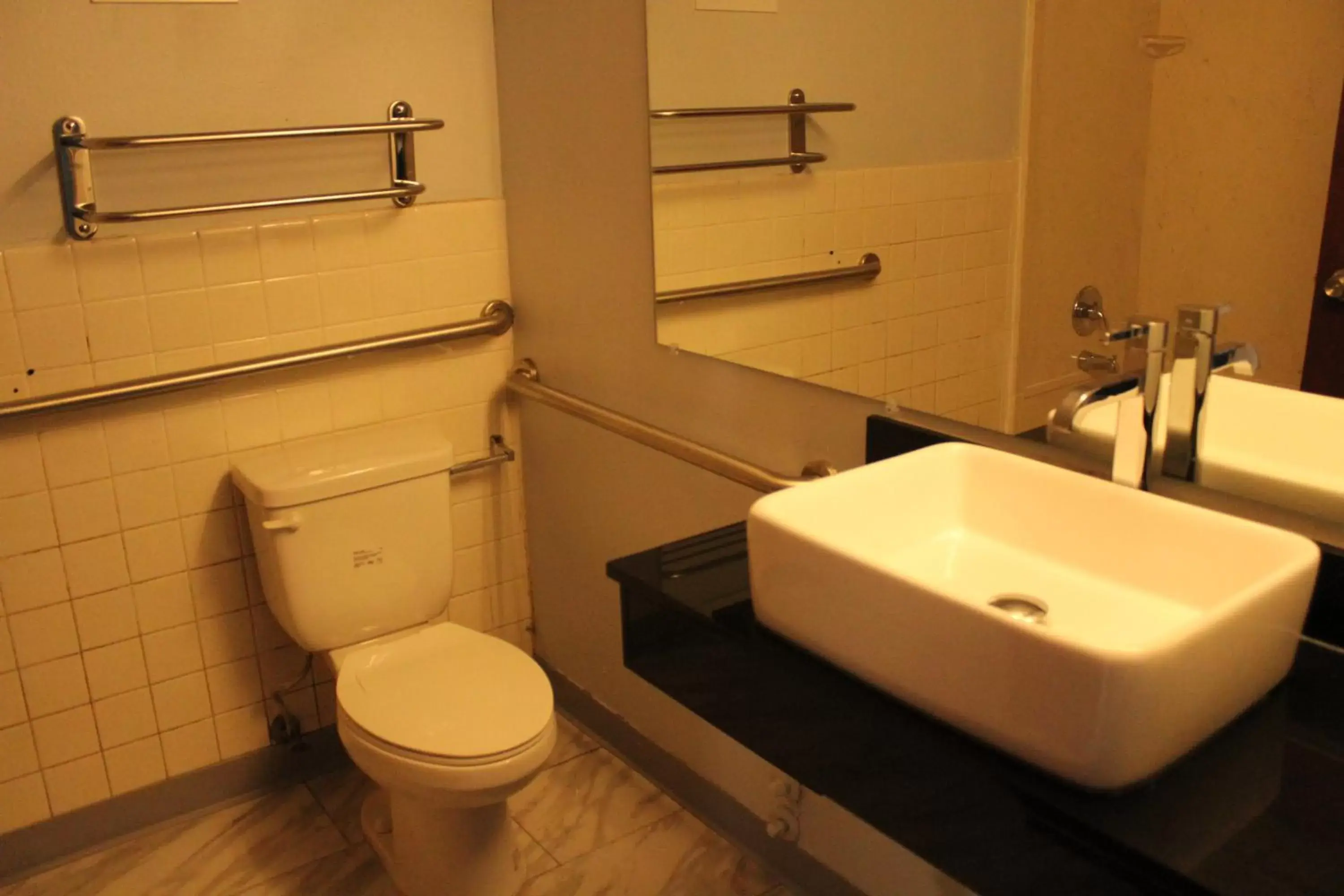 Bathroom in Travelodge by Wyndham Water's Edge Hotel - Racine