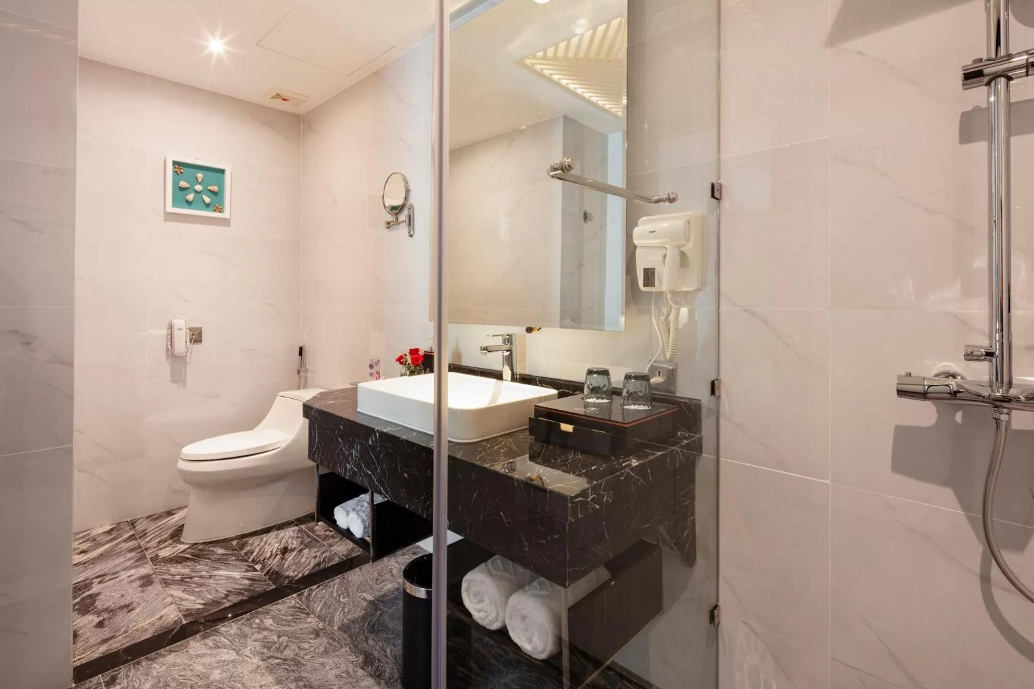 Shower in Erica Nha Trang Hotel