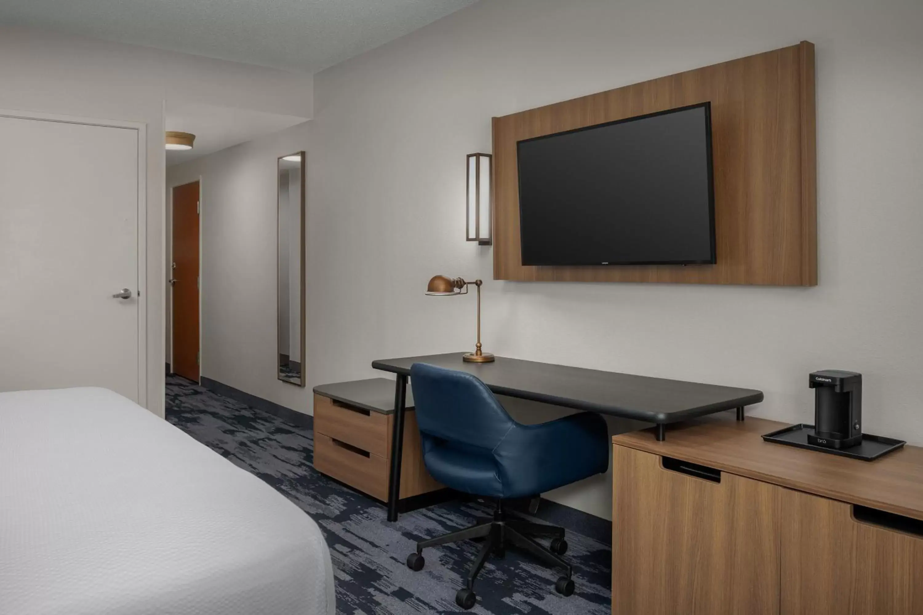 Photo of the whole room, TV/Entertainment Center in Fairfield Inn & Suites Roanoke Hollins/I-81