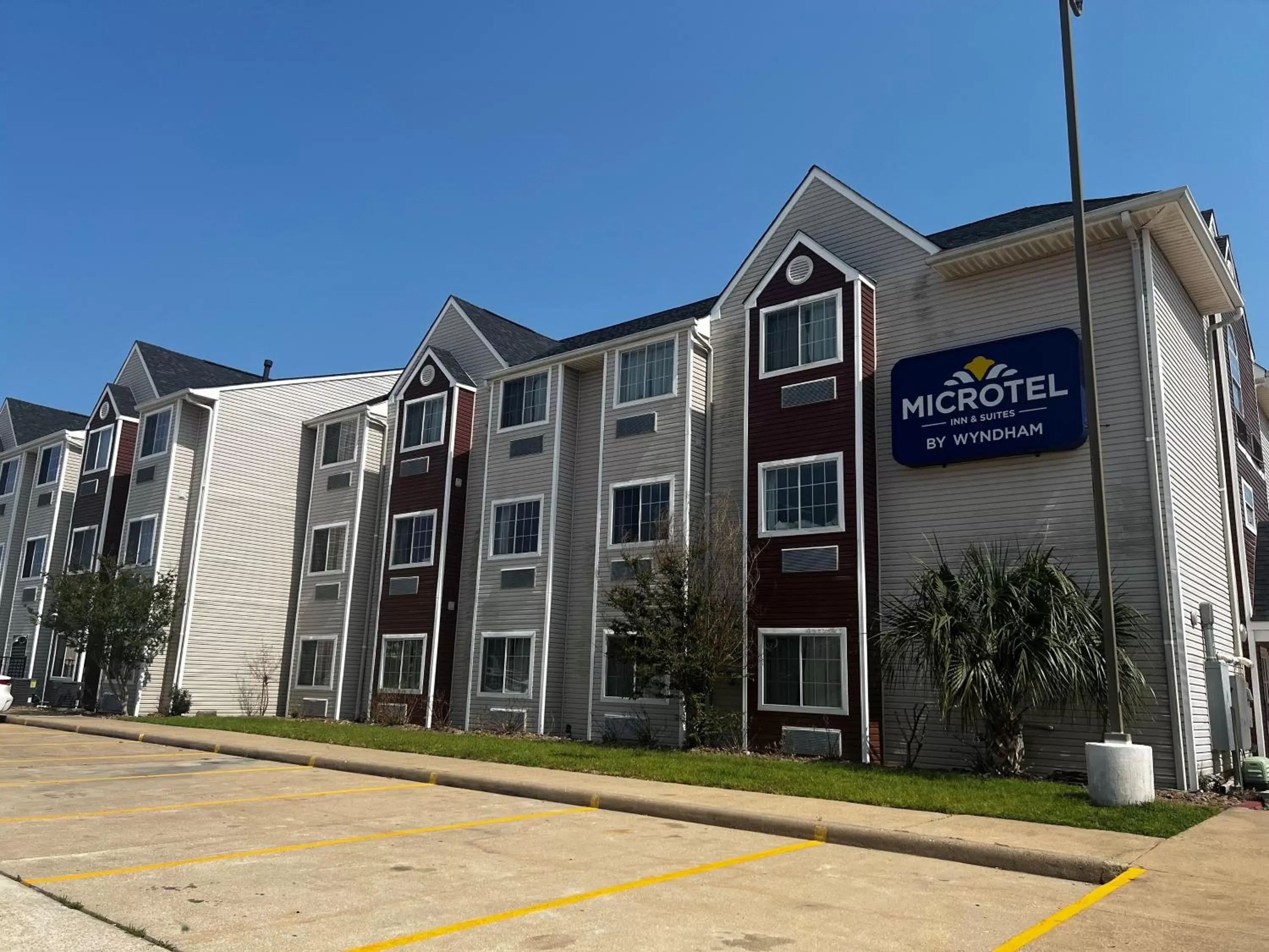 Property logo or sign, Property Building in Microtel Inn & Suites by Wyndham Houston/Webster/Nasa/Clearlake