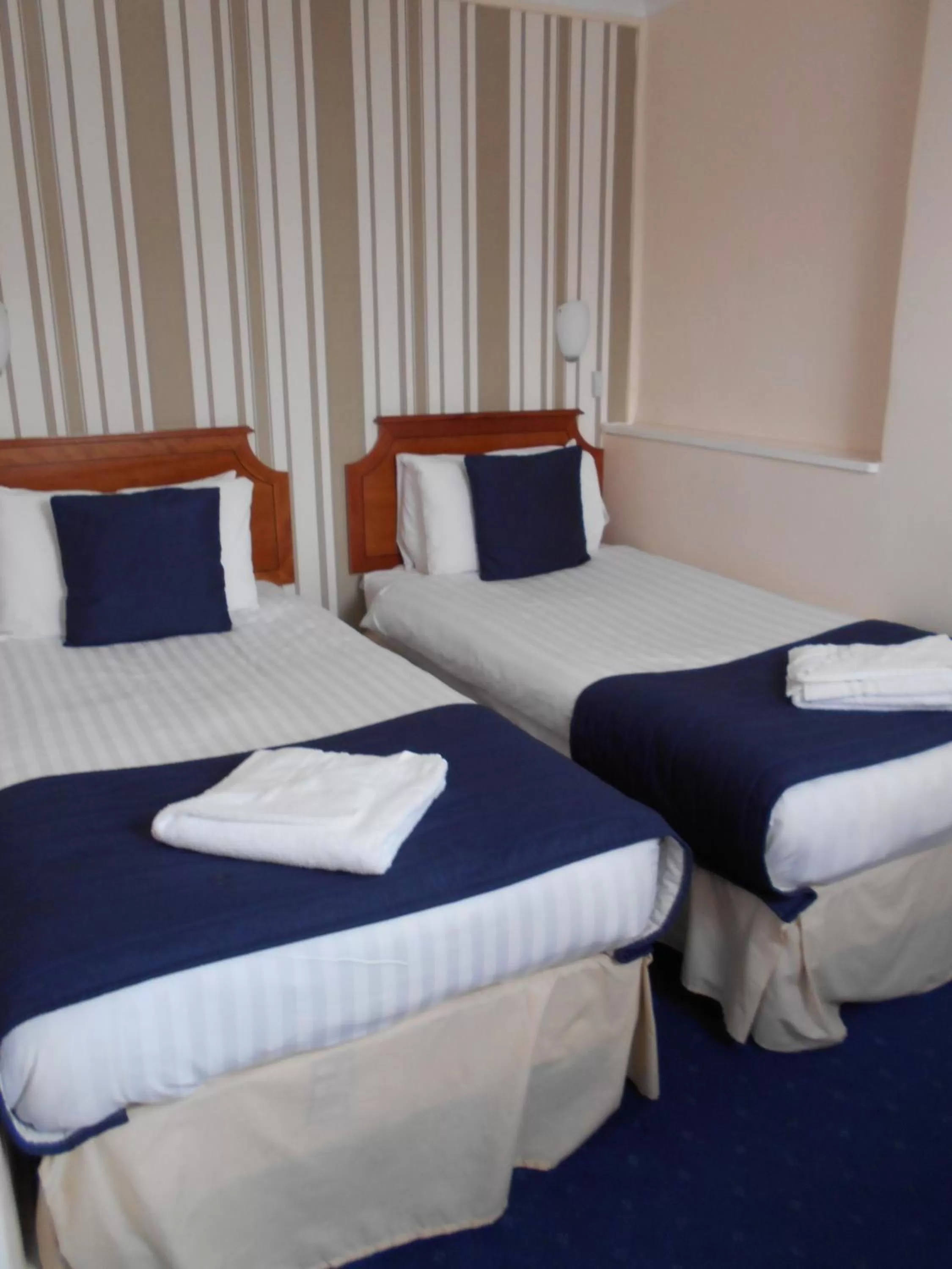 Bed in Parkwood Hotel