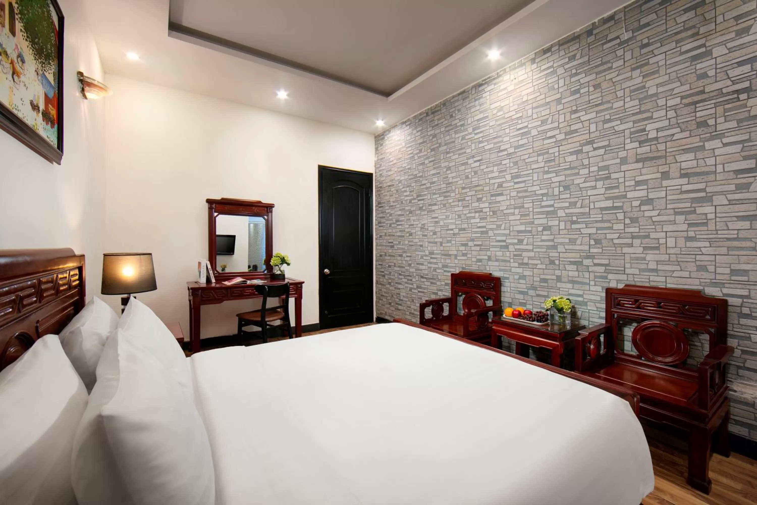 Bed in Bonjour Hanoi Hotel & Travel