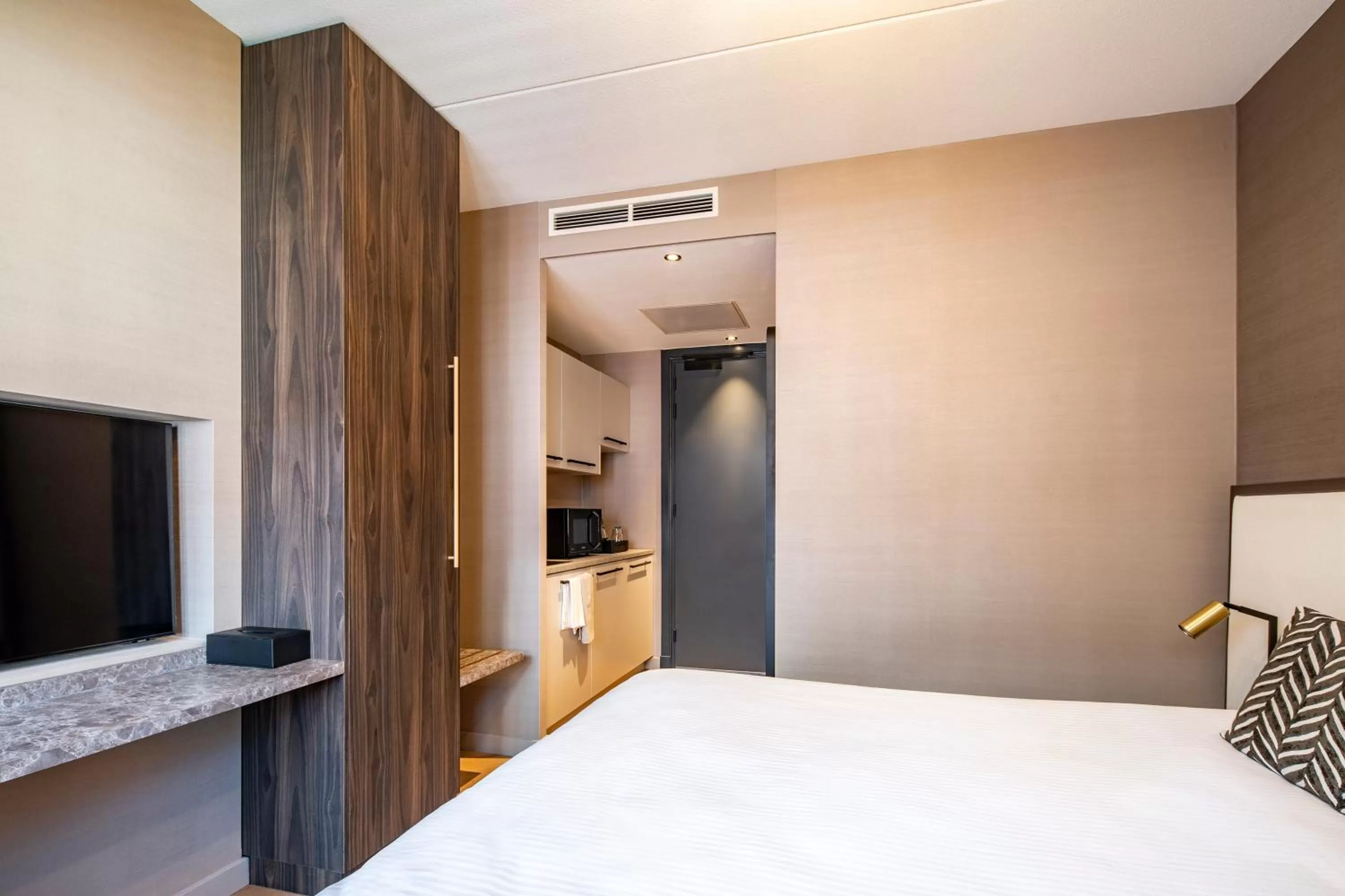 Bed in Breathe Boutique Hotel