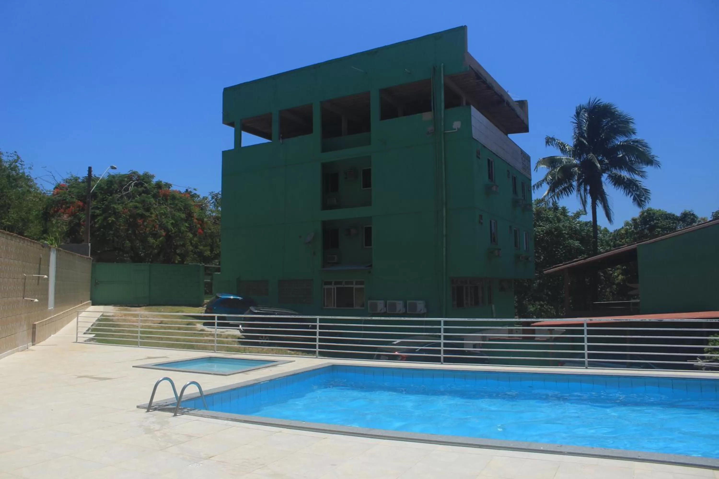 Swimming pool in Pousada Recanto Setiba