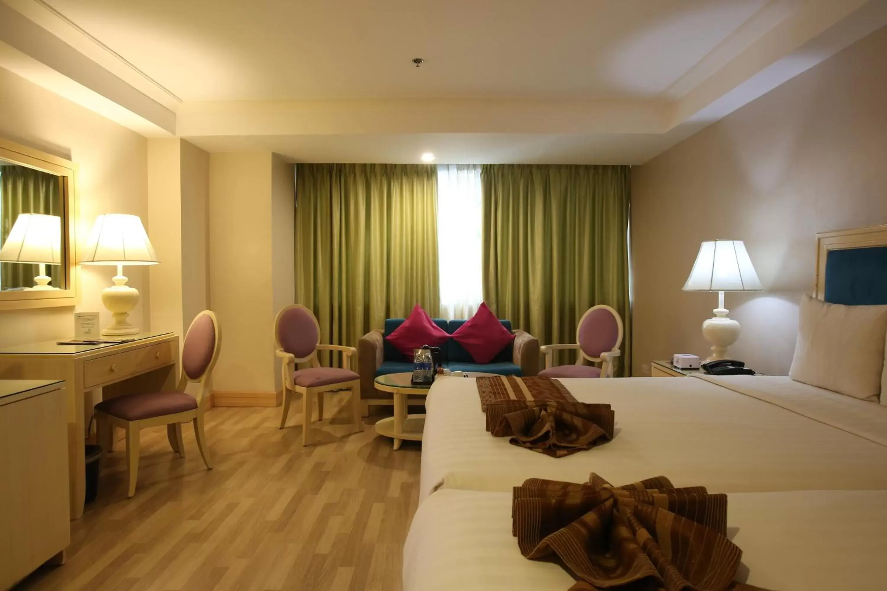 Bed in Crown Regency Hotel & Towers