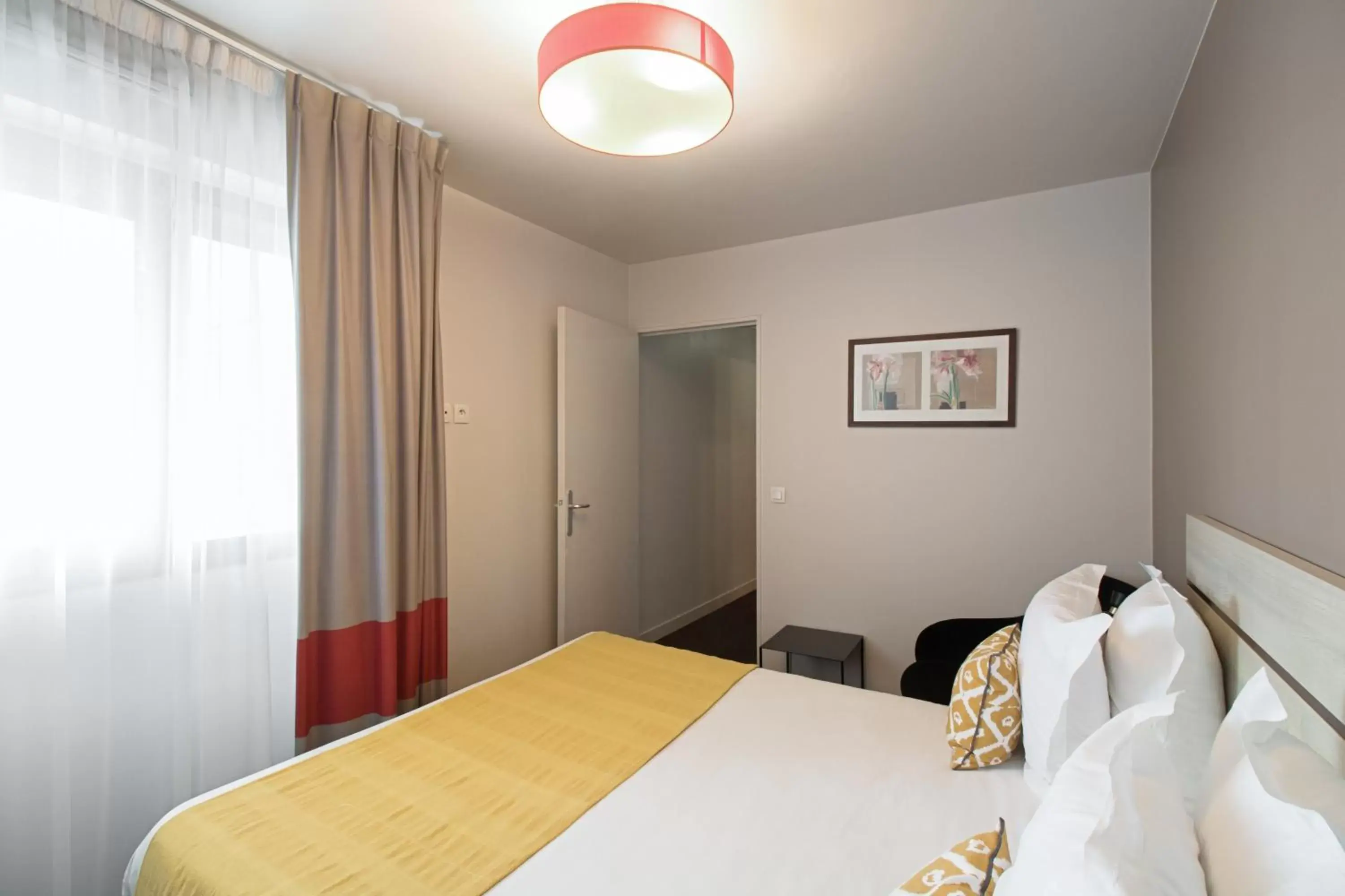 Bed in Appart'City Confort Paris Villejuif (Ex Park&Suites)
