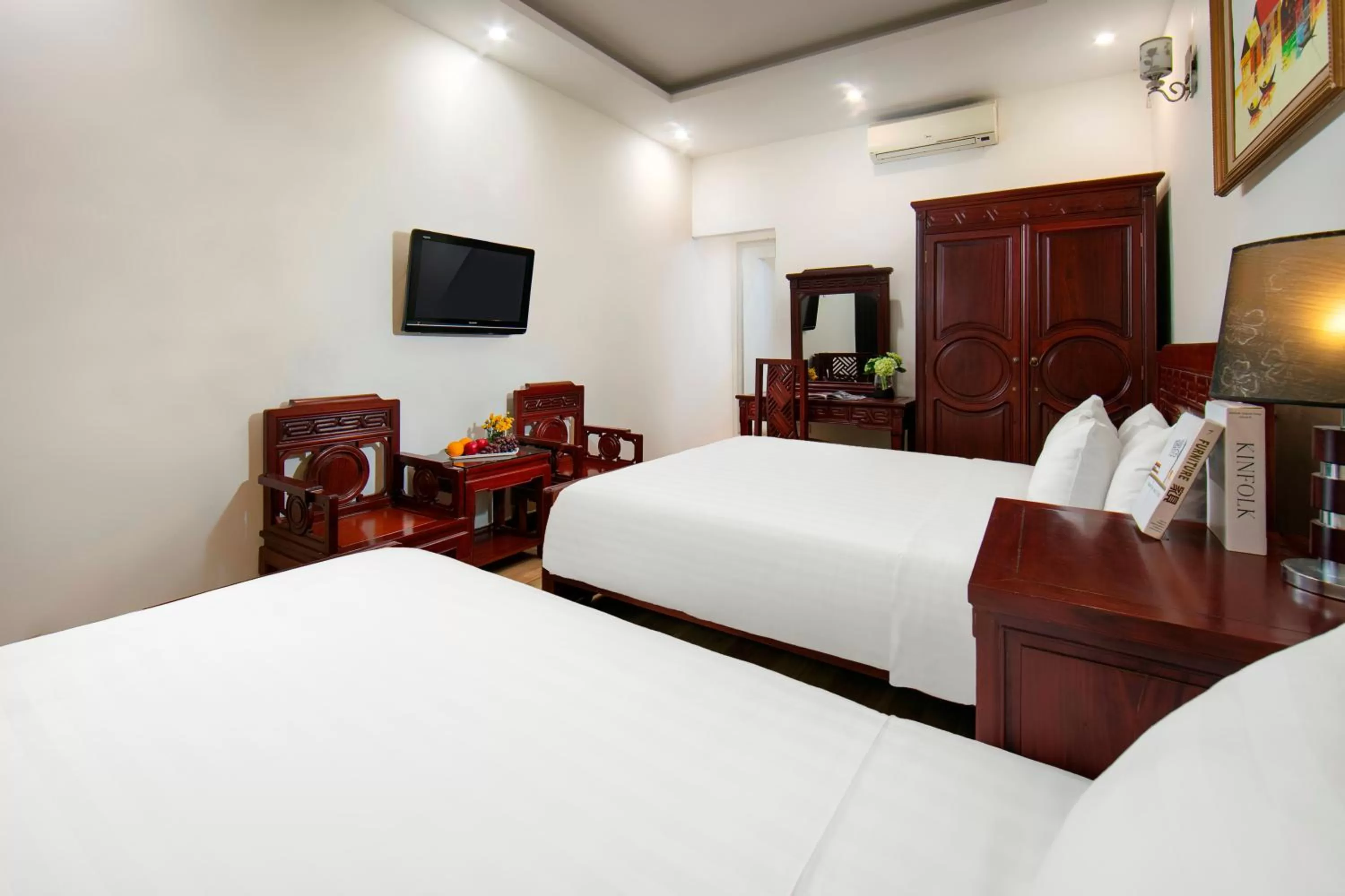 Bed in Bonjour Hanoi Hotel & Travel