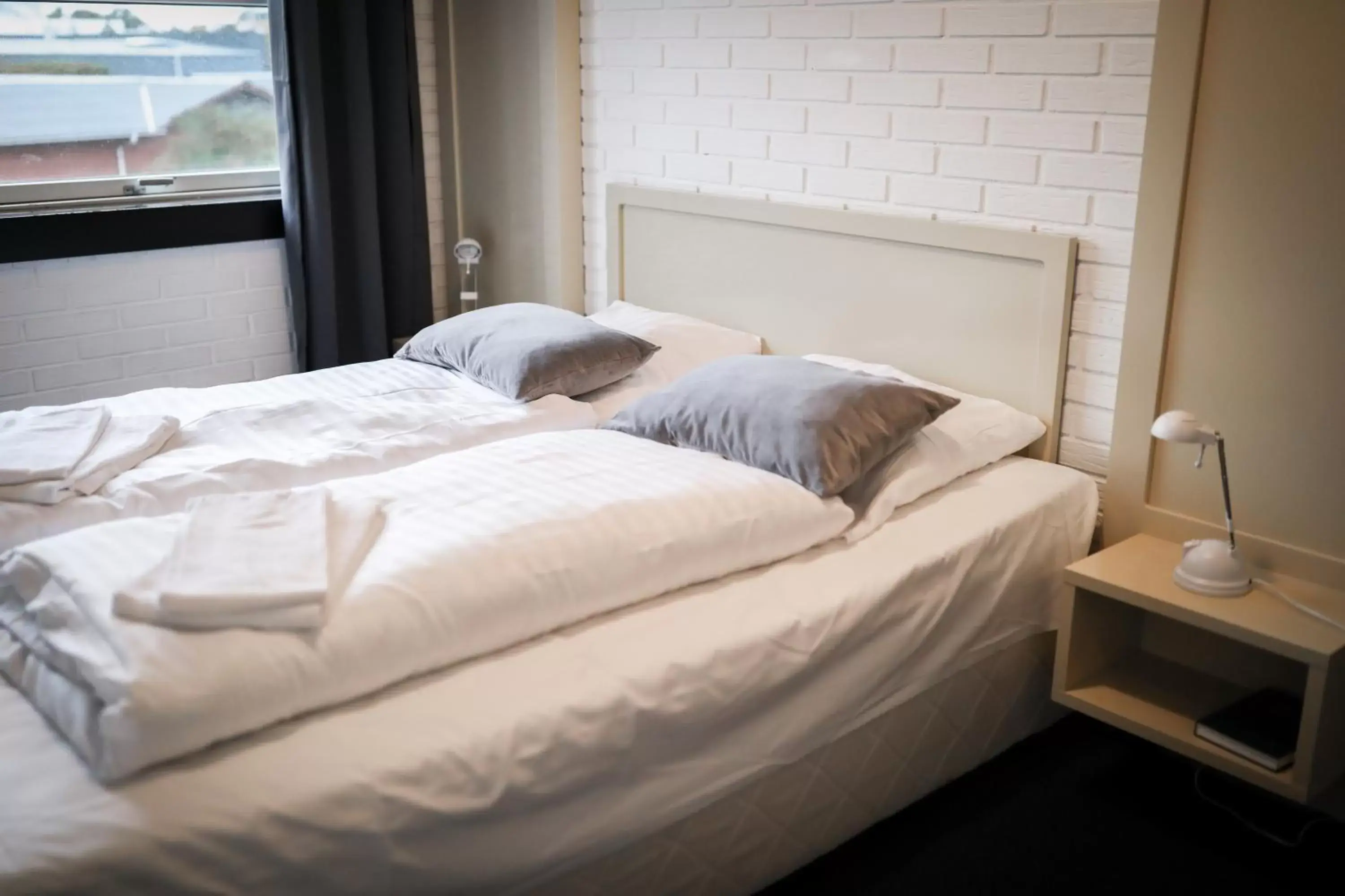 Bed in Dolphin Hotel Herning