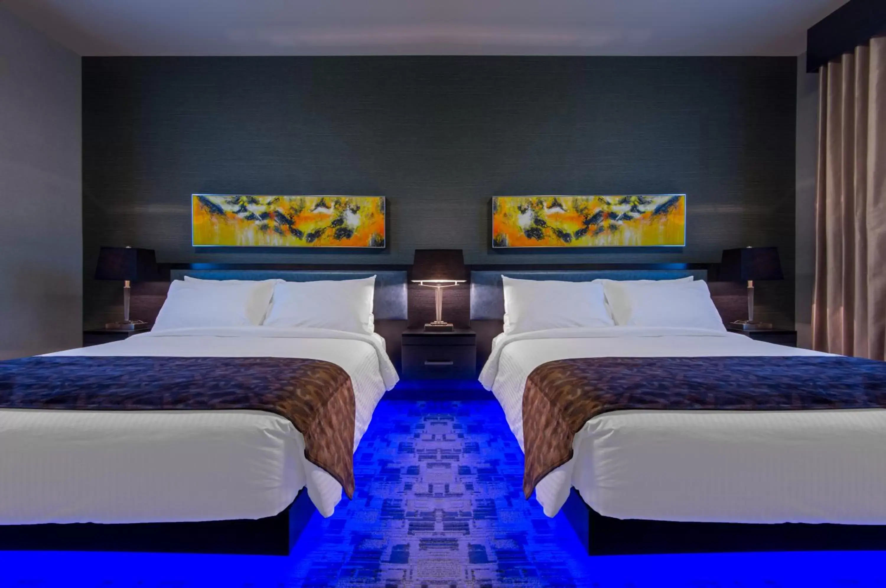 Bed in Applause Hotel Calgary Airport by CLIQUE Bed in Applause Hotel Calgary Airport by CLIQUE