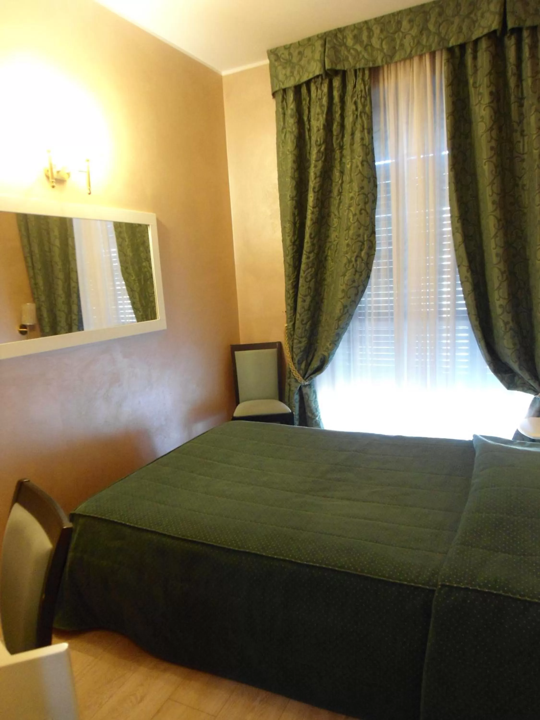 Bed in Hotel Continental