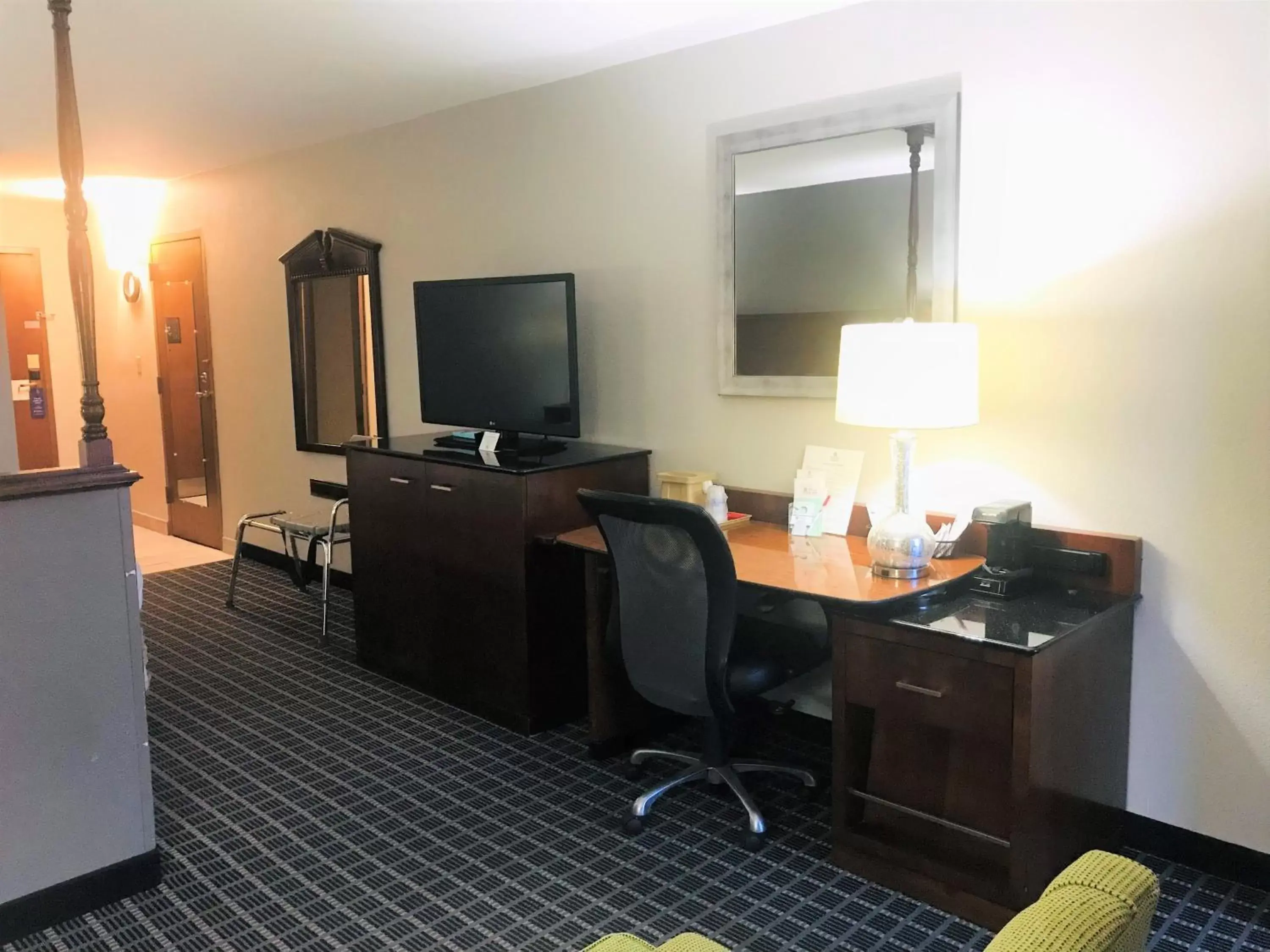 TV and multimedia, TV/Entertainment Center in SureStay Plus Hotel by Best Western Greenwood