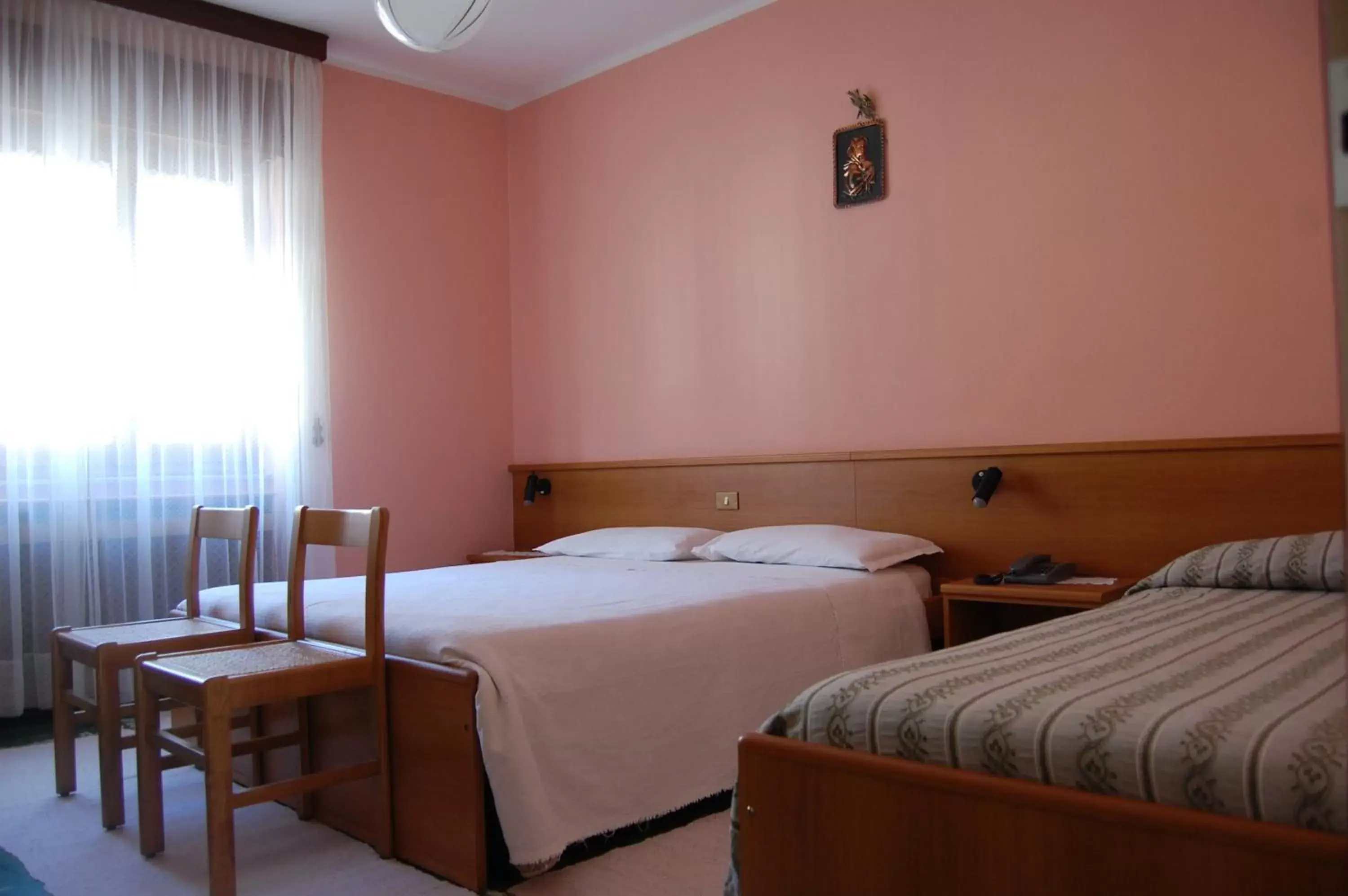 Bed in Albergo Motel Dosdè
