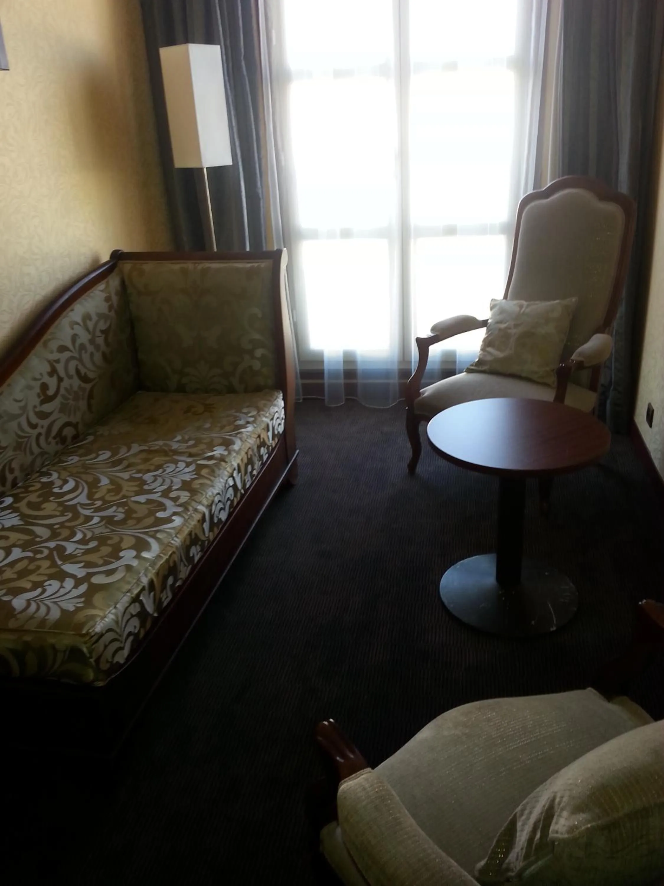 Seating area, Bed in Hotel De France
