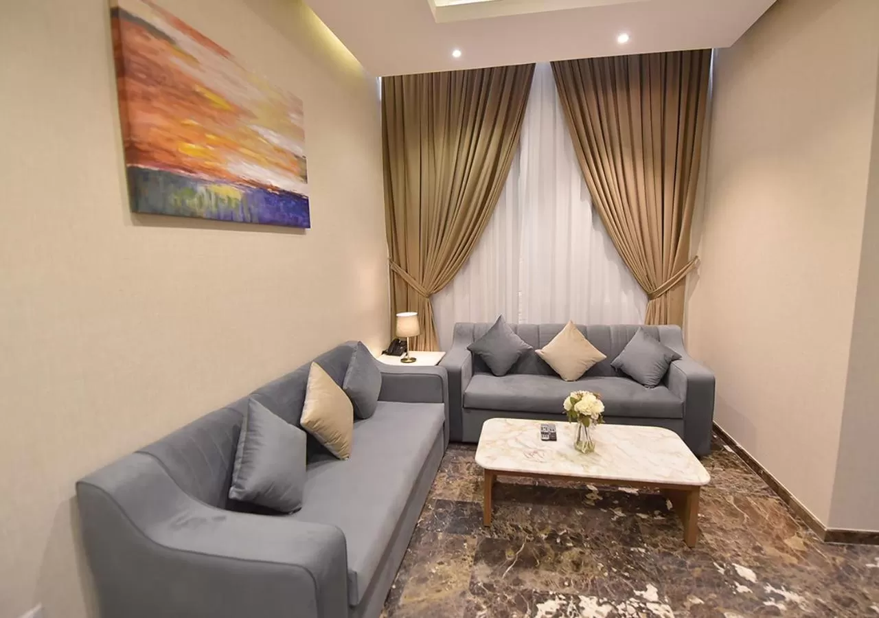 Communal lounge/ TV room, Seating Area in Rihanna Hotel Apartment