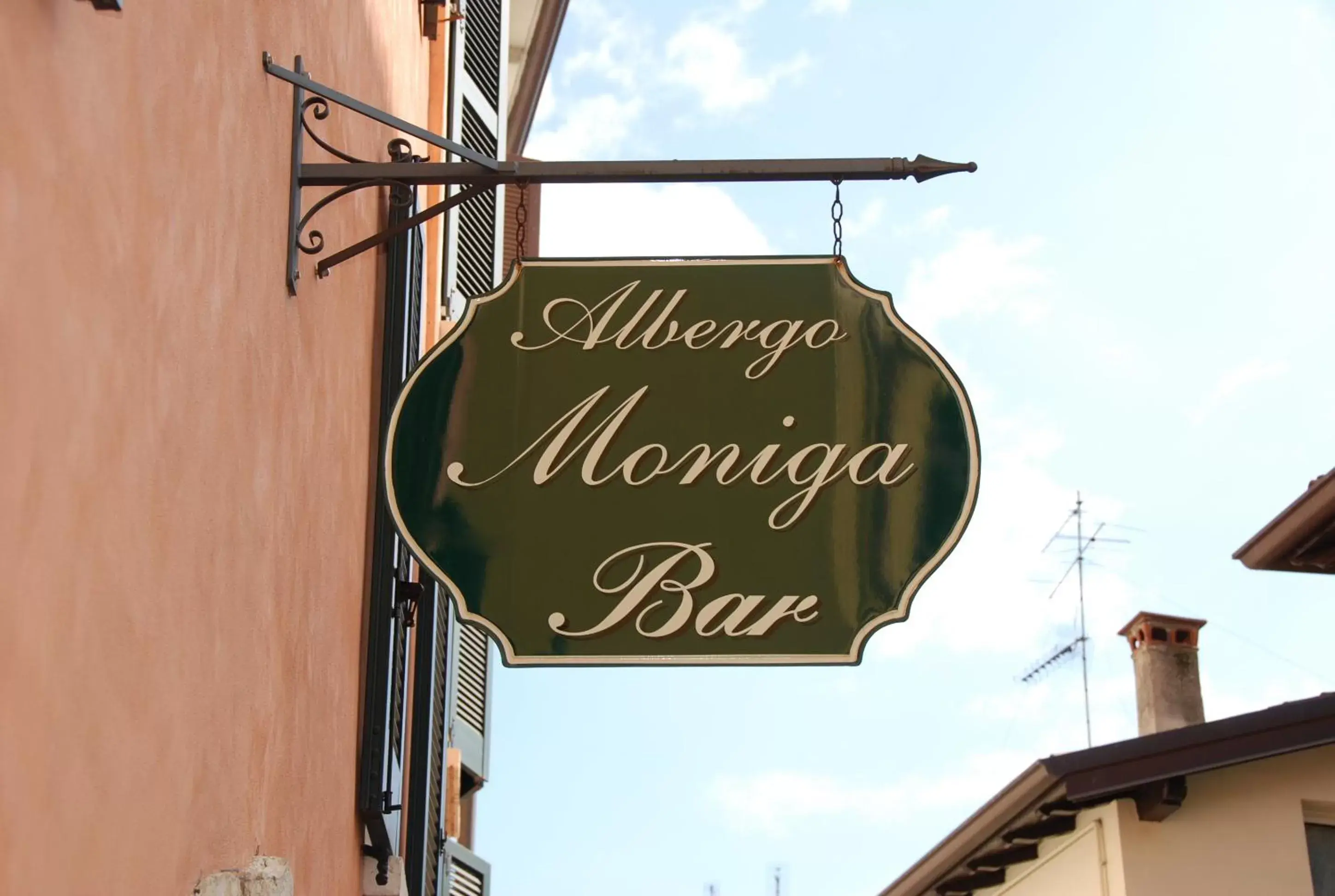 Property logo or sign in Hotel Moniga