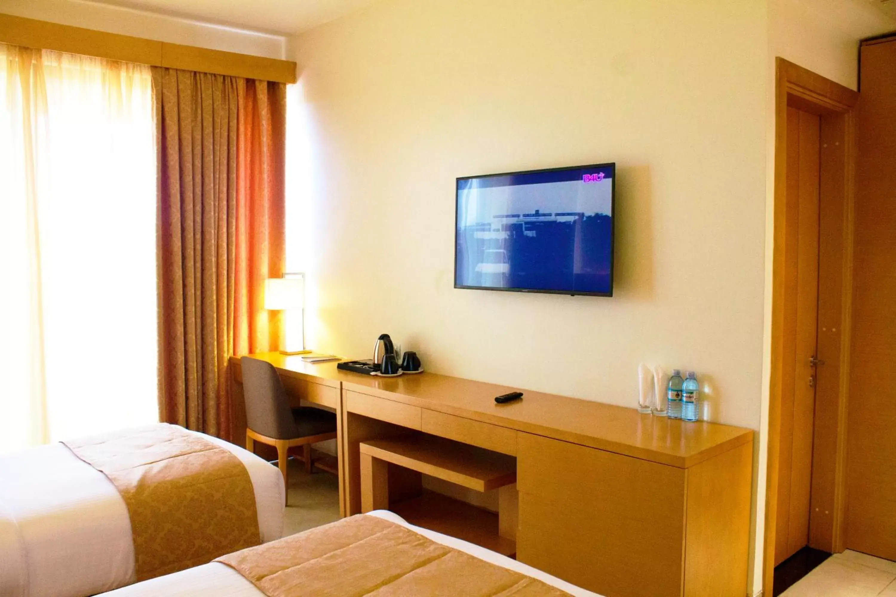 Photo of the whole room, TV/Entertainment Center in K Hotels Entebbe