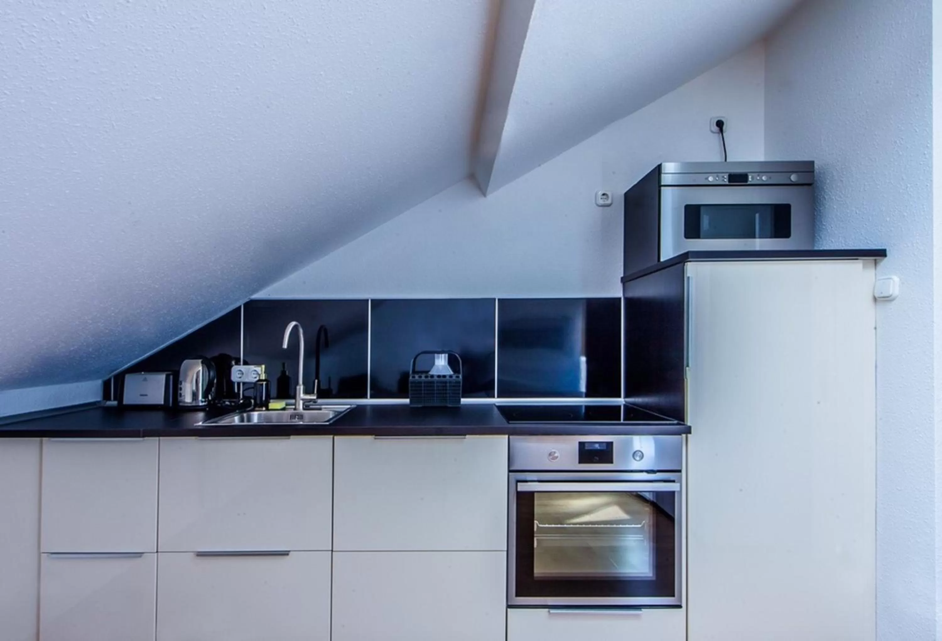 Kitchen or kitchenette in Milford Suites Budapest