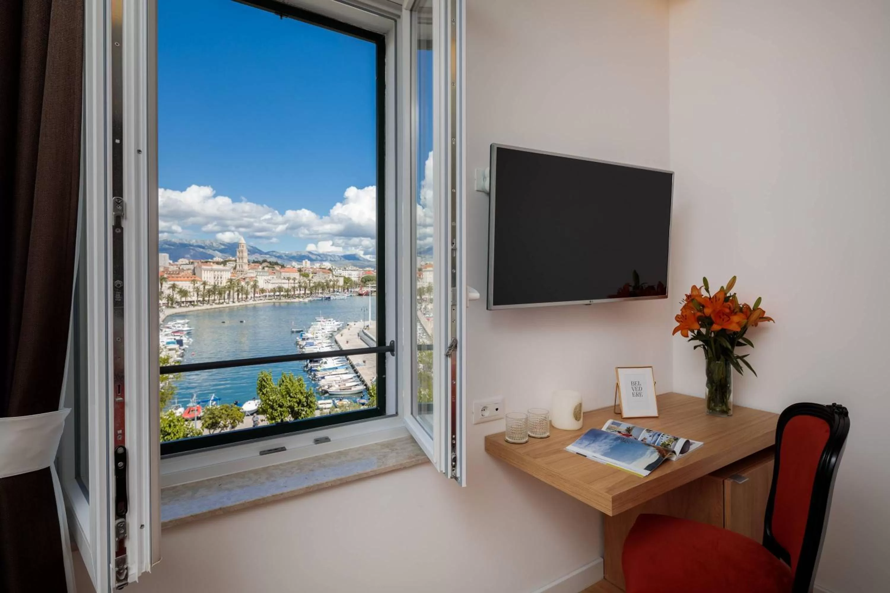 City view, TV/Entertainment Center in Belvedere Luxury Rooms - Breathtaking View