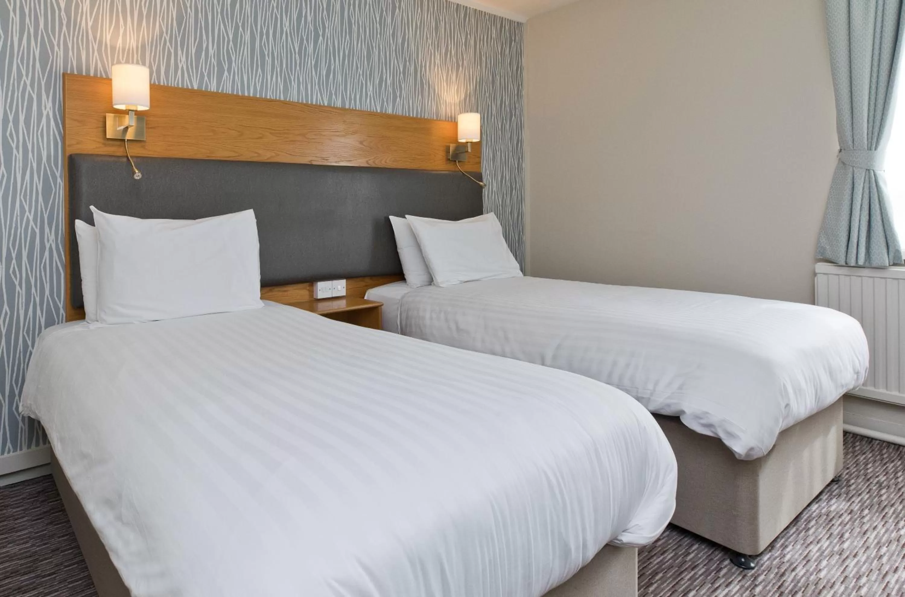 Bed in Blue Bell Lodge Hotel