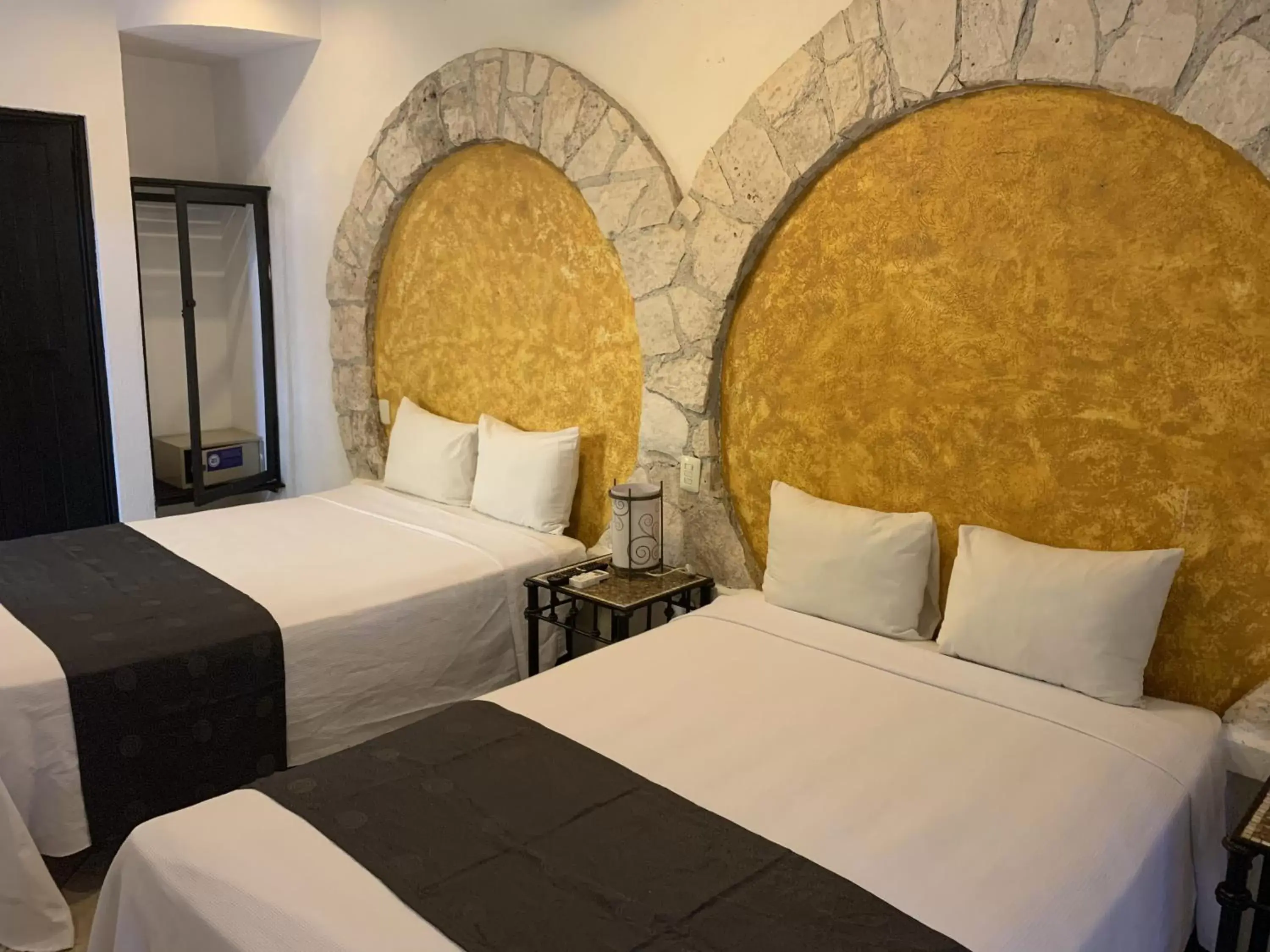 Bed in Tukan Hotel Playa del Carmen