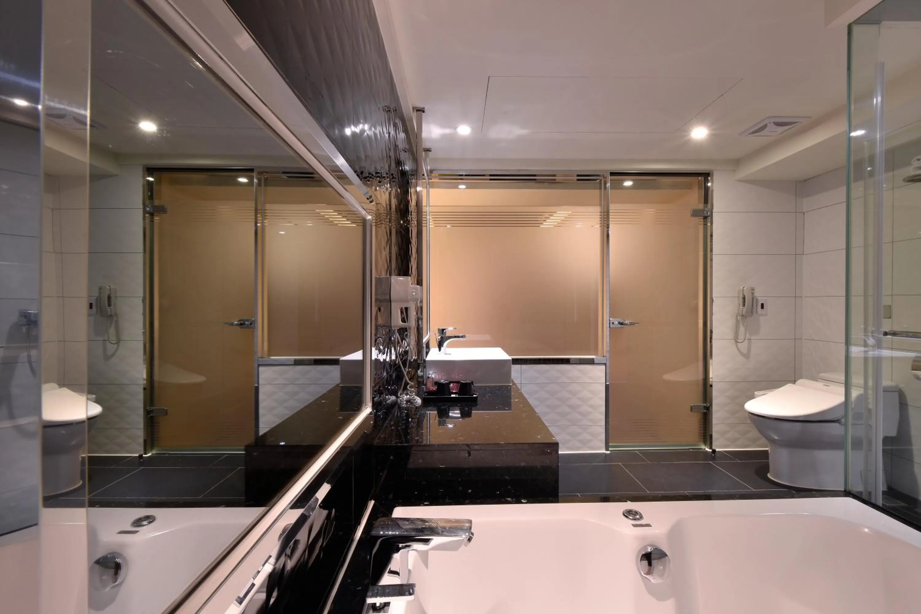 Bathroom in V-one Vogue Hotel