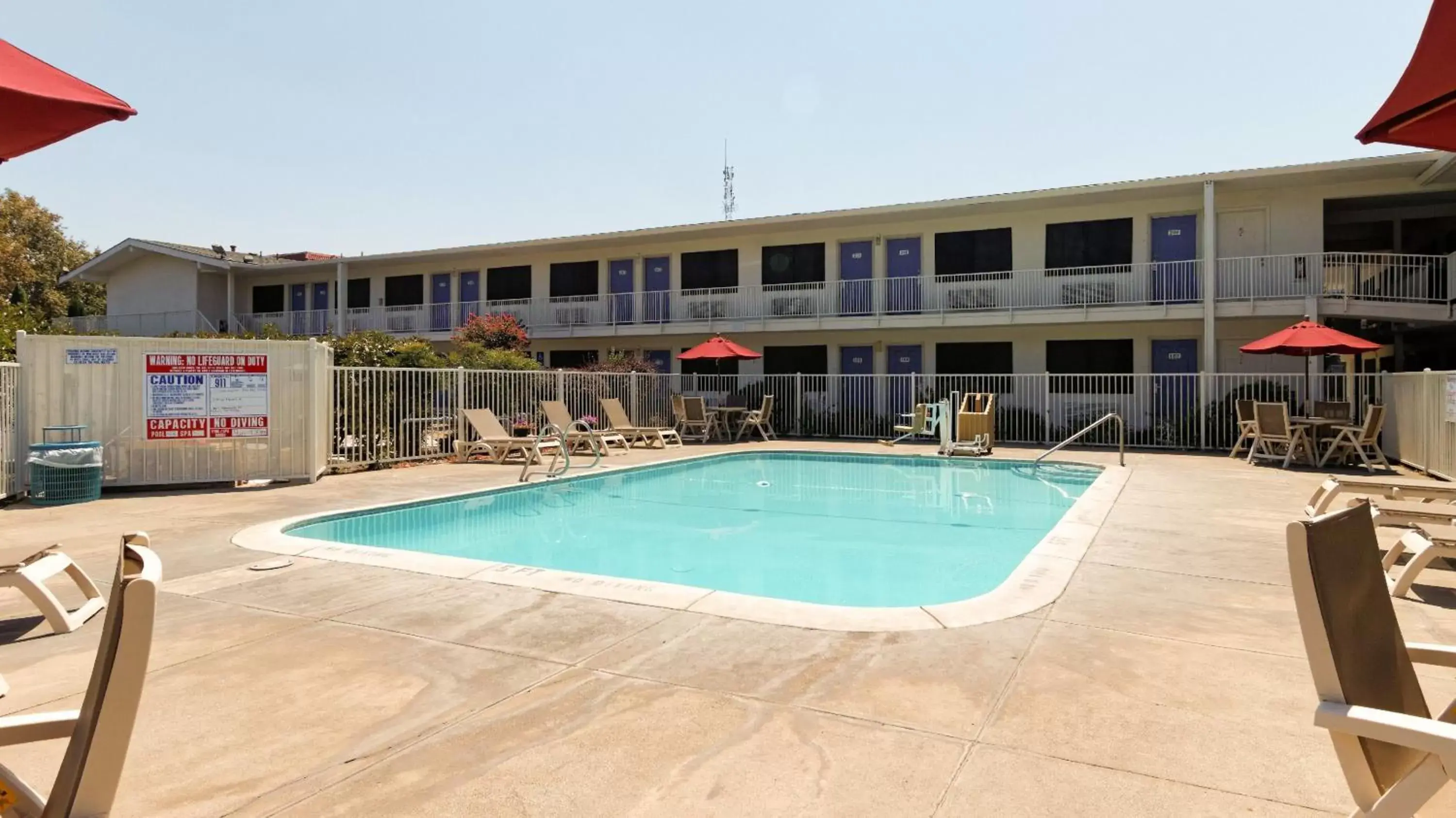 Swimming pool, Property Building in Motel 6-Chico, CA
