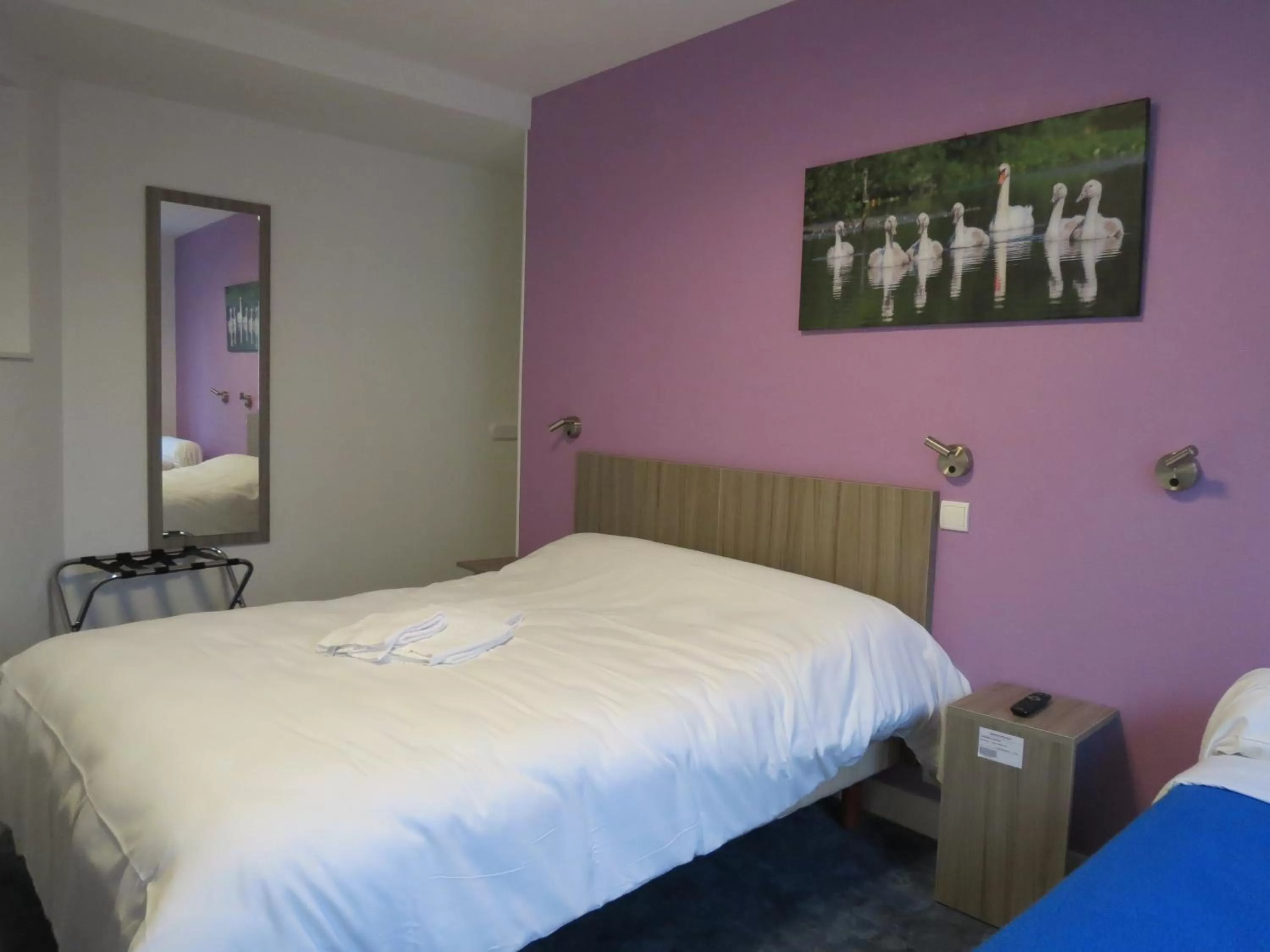 Bed in Hotel le Faisan