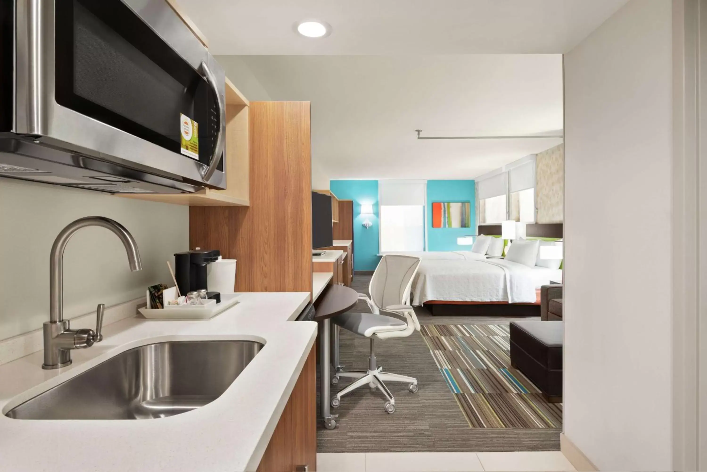 Bedroom, Kitchen/Kitchenette in Home2 Suites by Hilton Woodbridge Potomac Mills