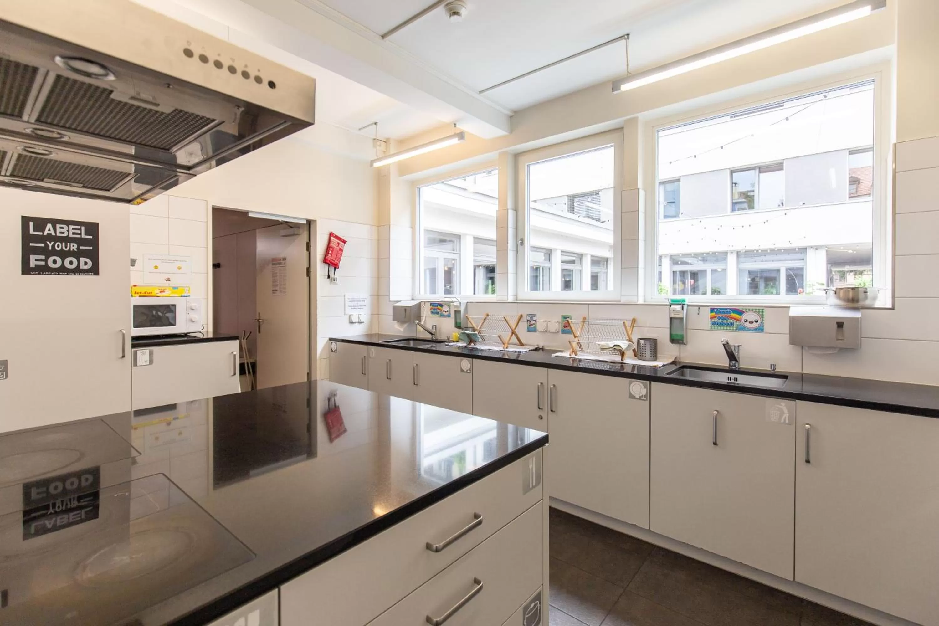 Communal kitchen in Hotel by Hyve Basel