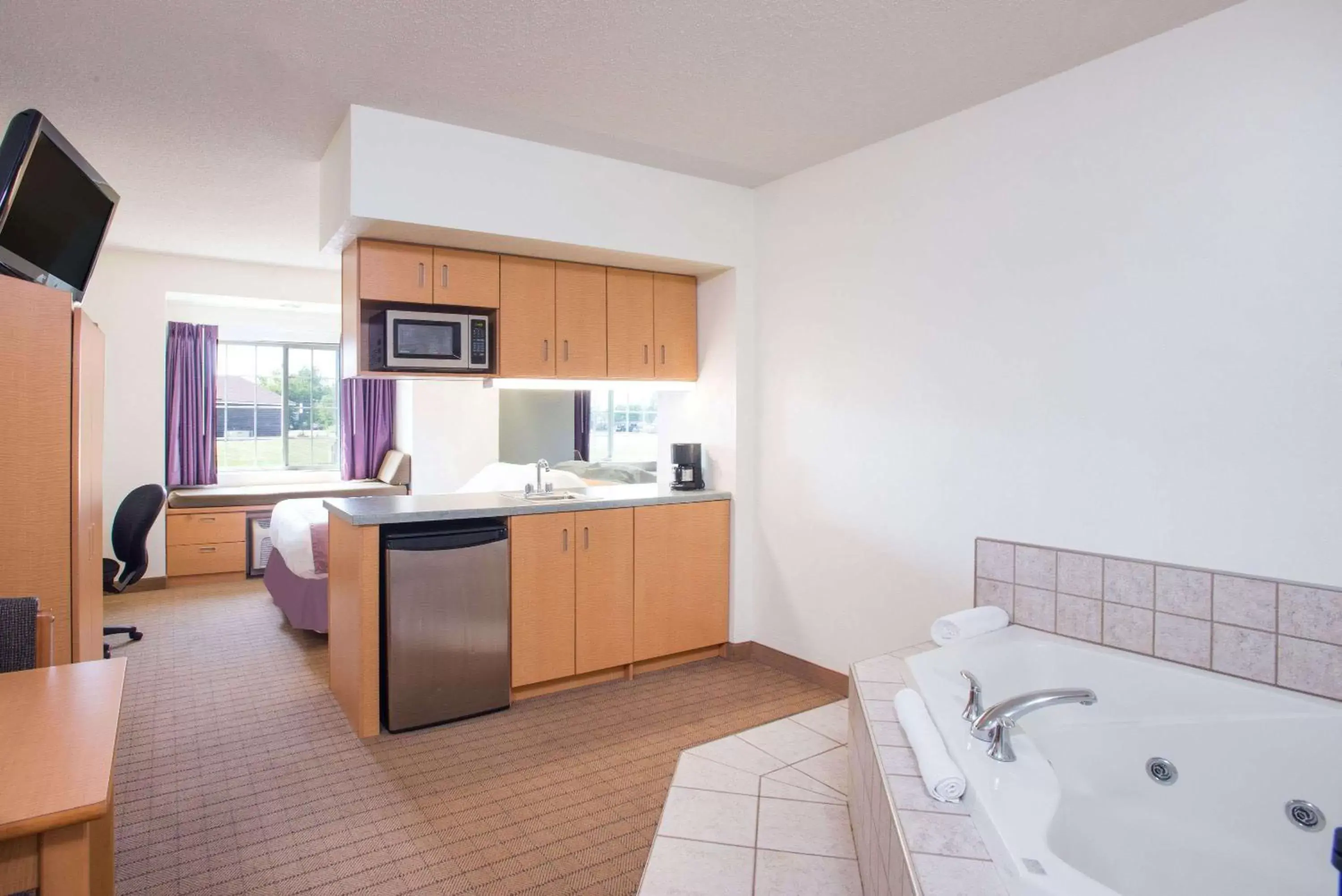 Photo of the whole room, Bathroom in Microtel Inn & Suites by Wyndham Plattsburgh
