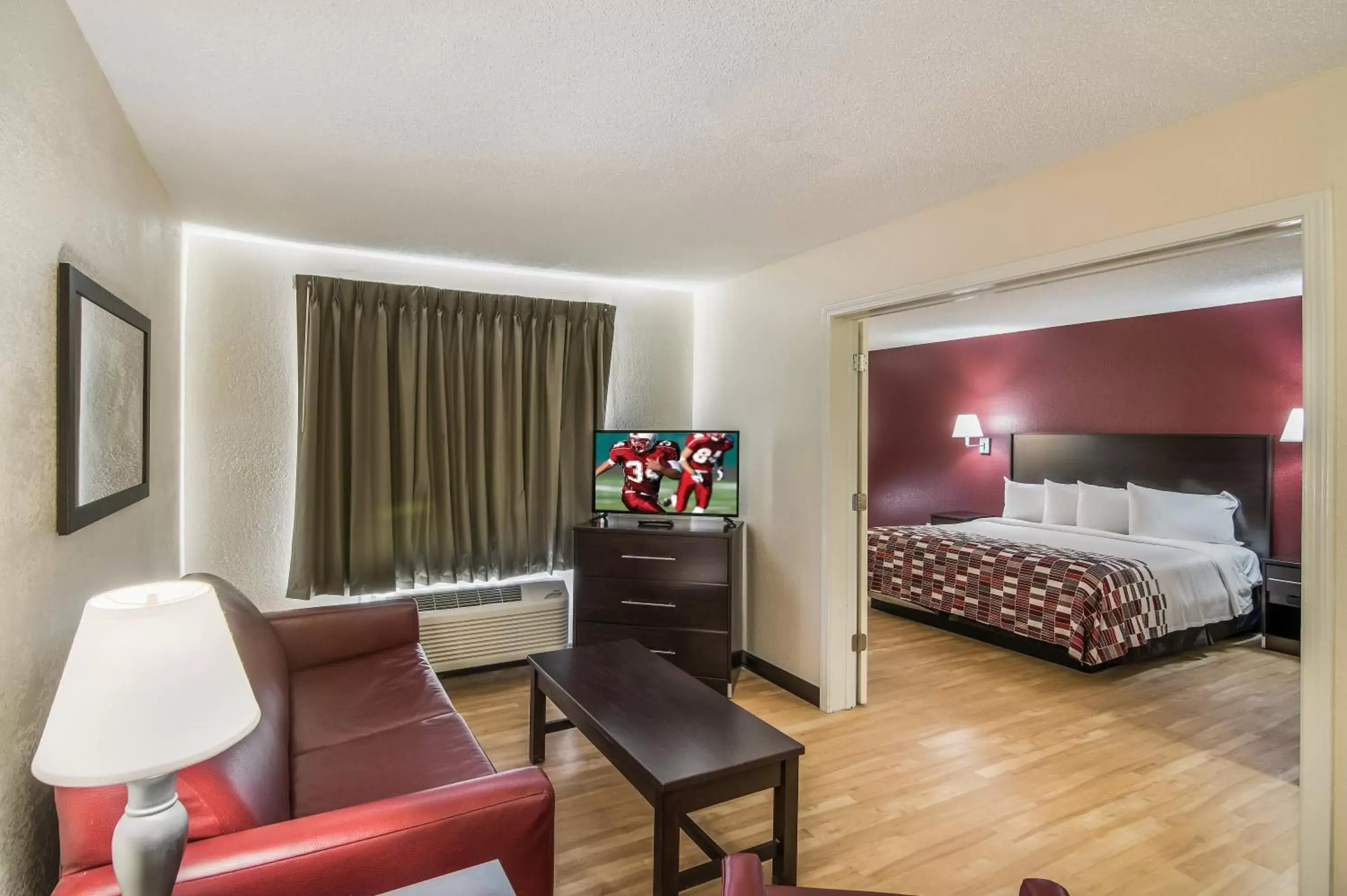 Bedroom in Red Roof Inn & Suites Pensacola East - Milton