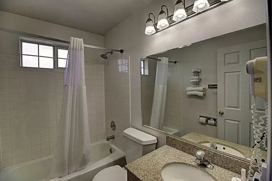 Bathroom in Days Inn & Suites by Wyndham Lolo