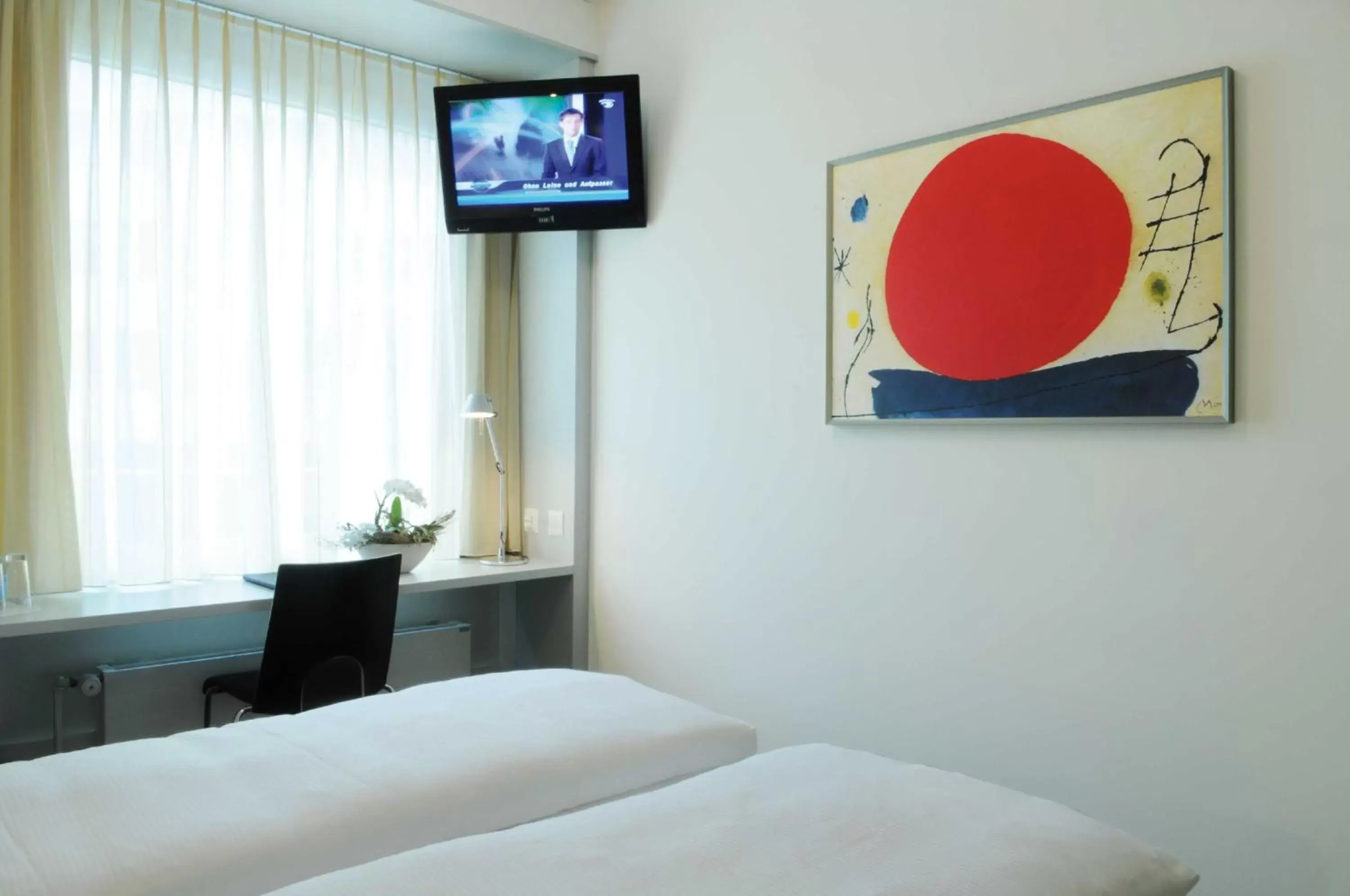 Bedroom, TV/Entertainment Center in Sorell Hotel Ador