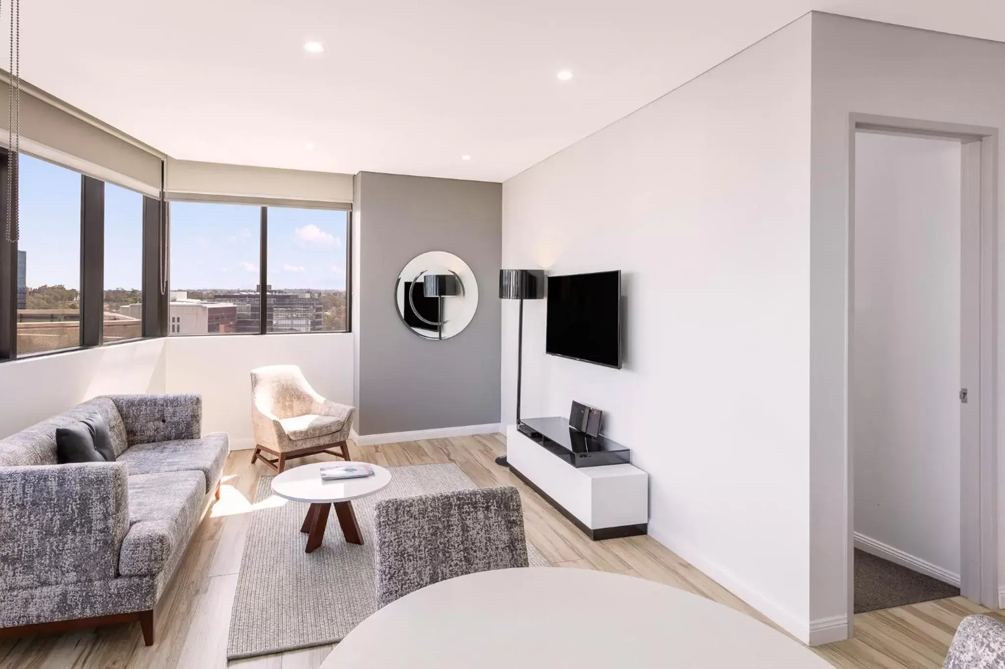 TV and multimedia, Seating Area in Meriton Suites Church Street, Parramatta