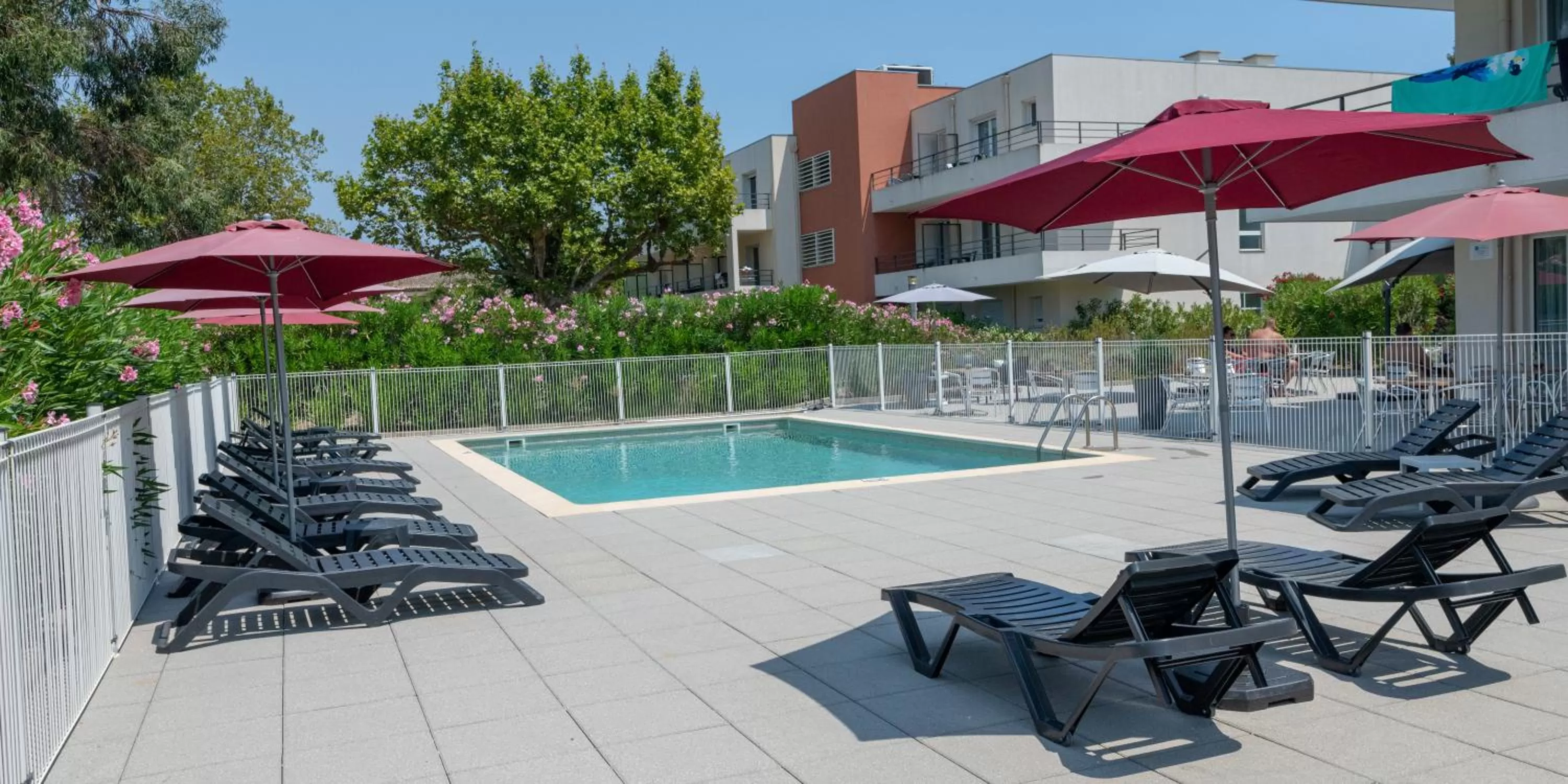 Swimming pool in Comfort Aparthotel Cannes Mandelieu