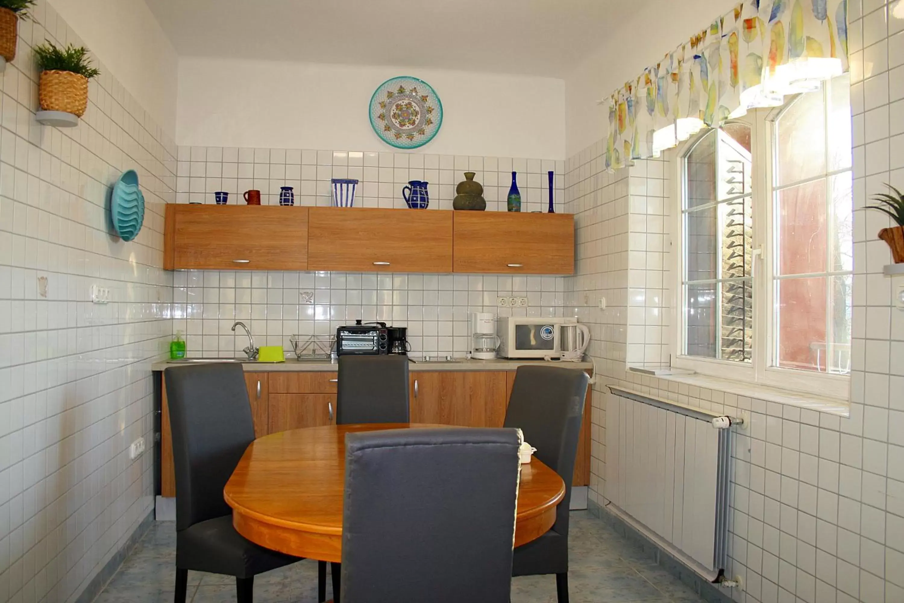 Kitchen/Kitchenette in Le Rose Hotel