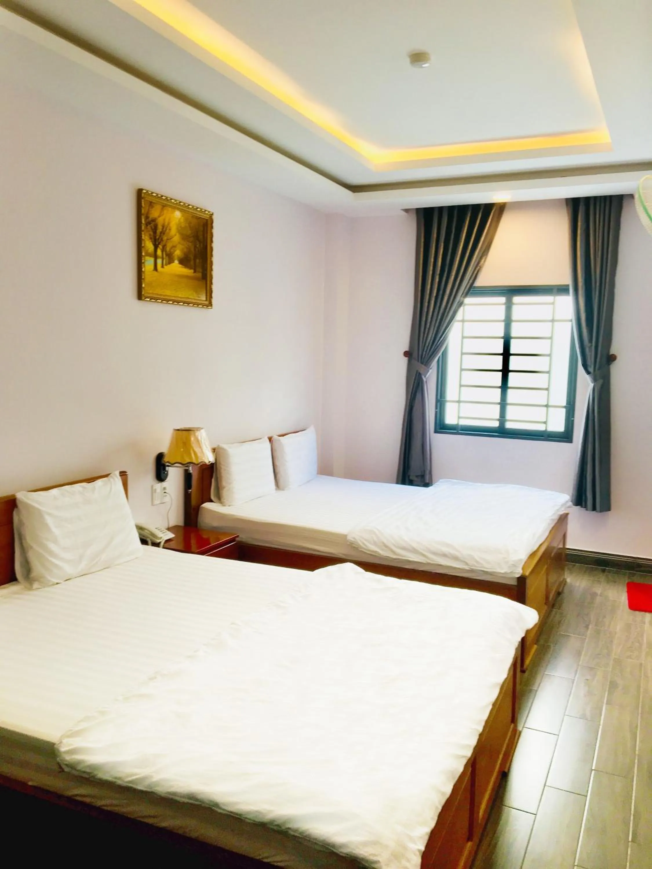 Bed in QUEEN VICTORIA Hotel