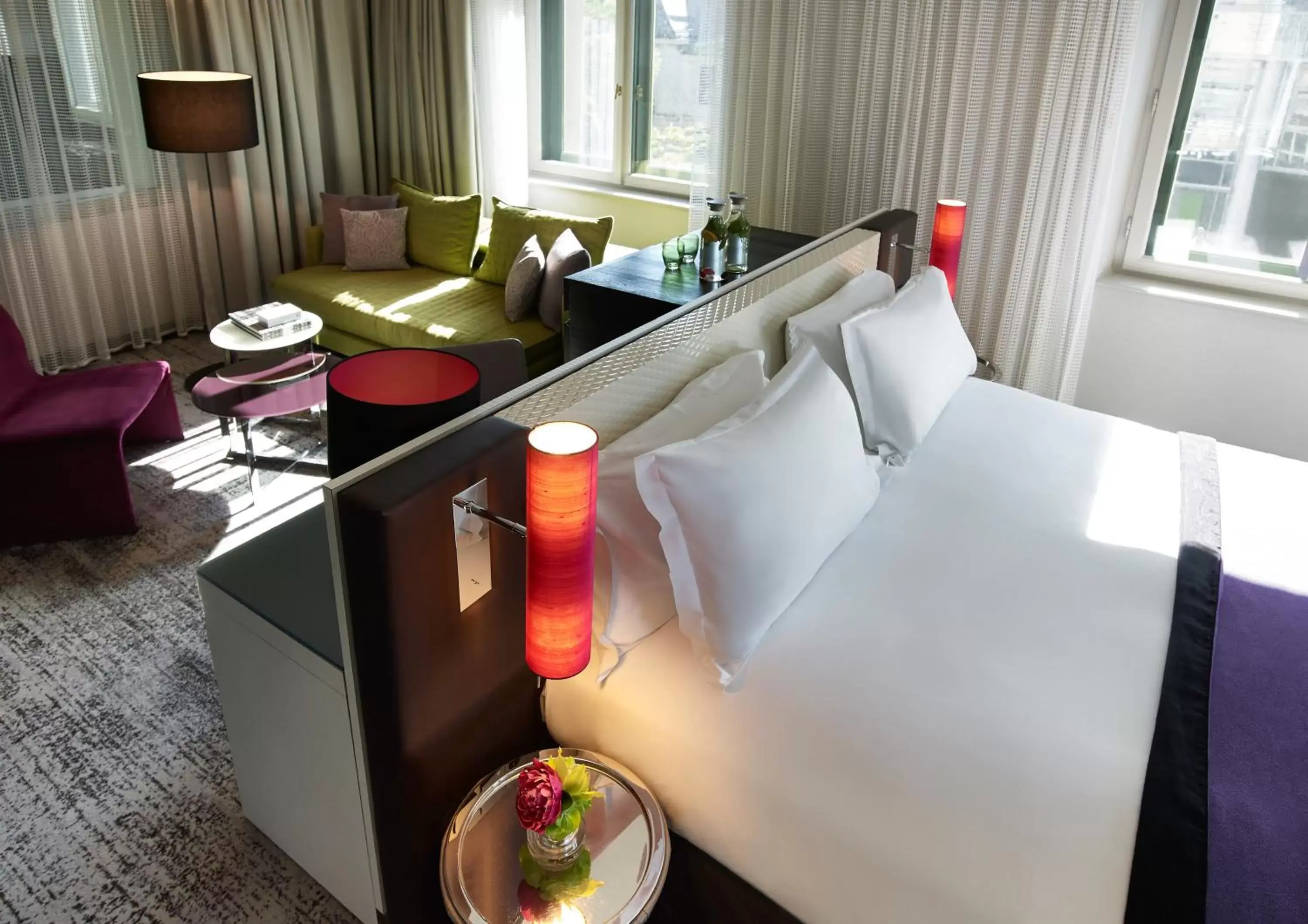 Seating area, Bed in Sofitel Munich Bayerpost