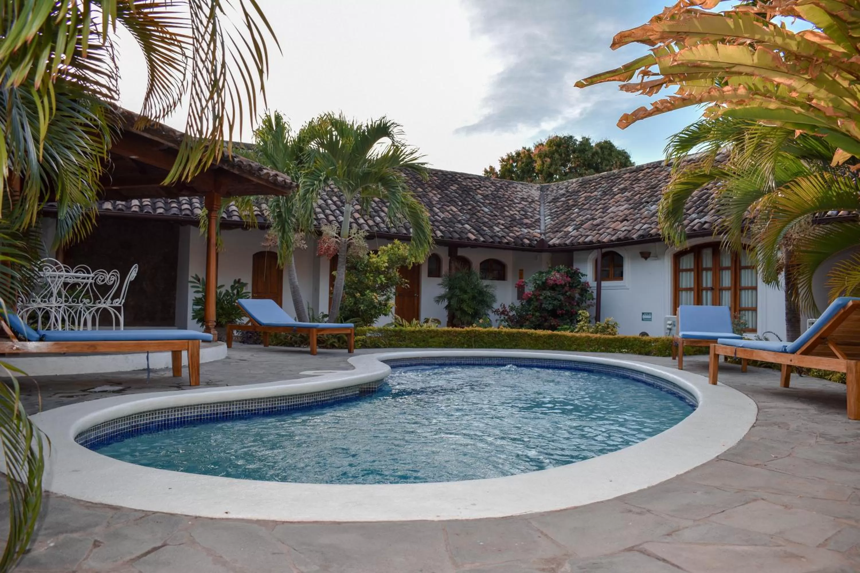 Swimming pool, Property Building in Hotel Boutique Adela