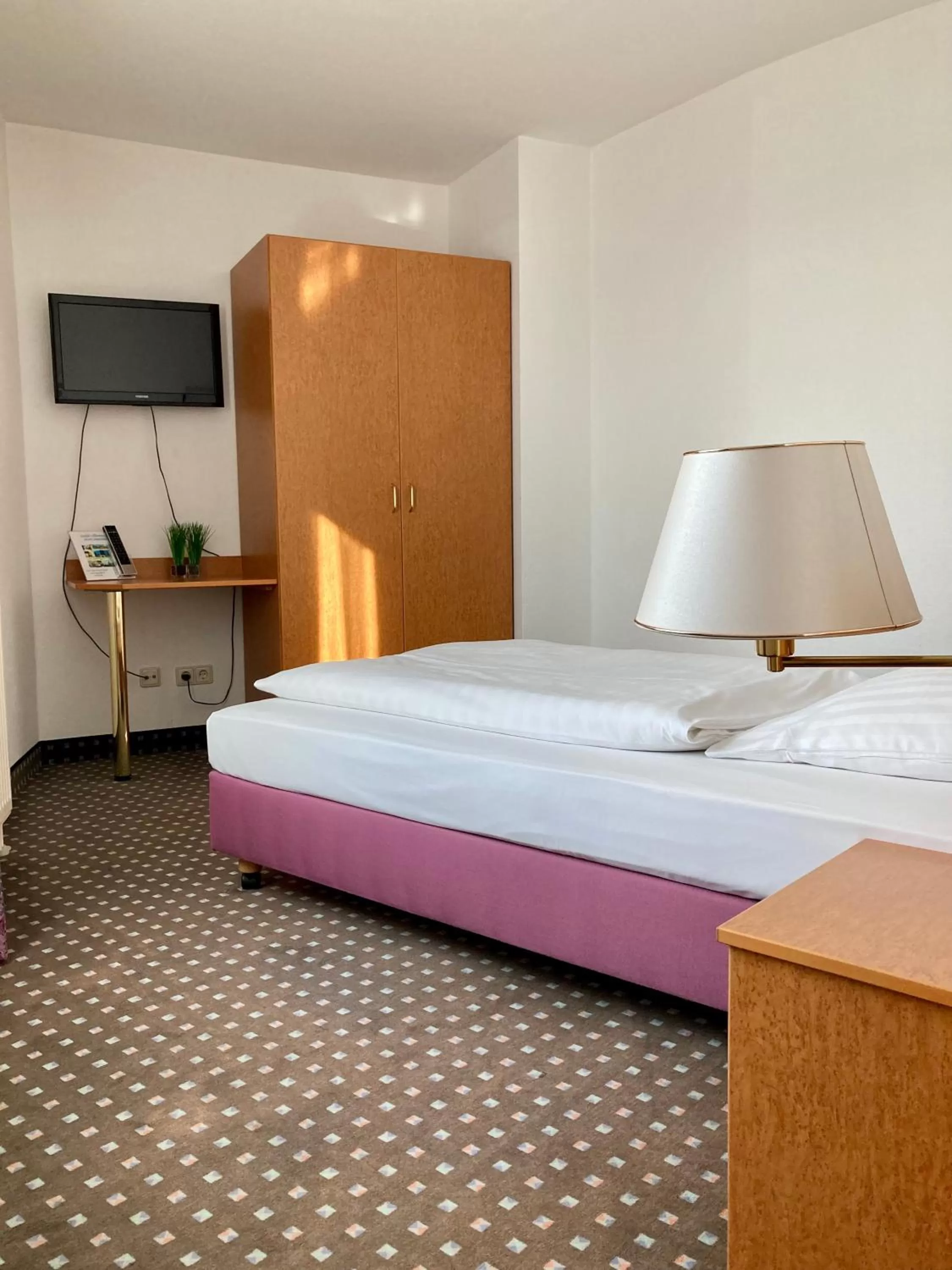 Bed in Akzent Congresshotel Hoyerswerda